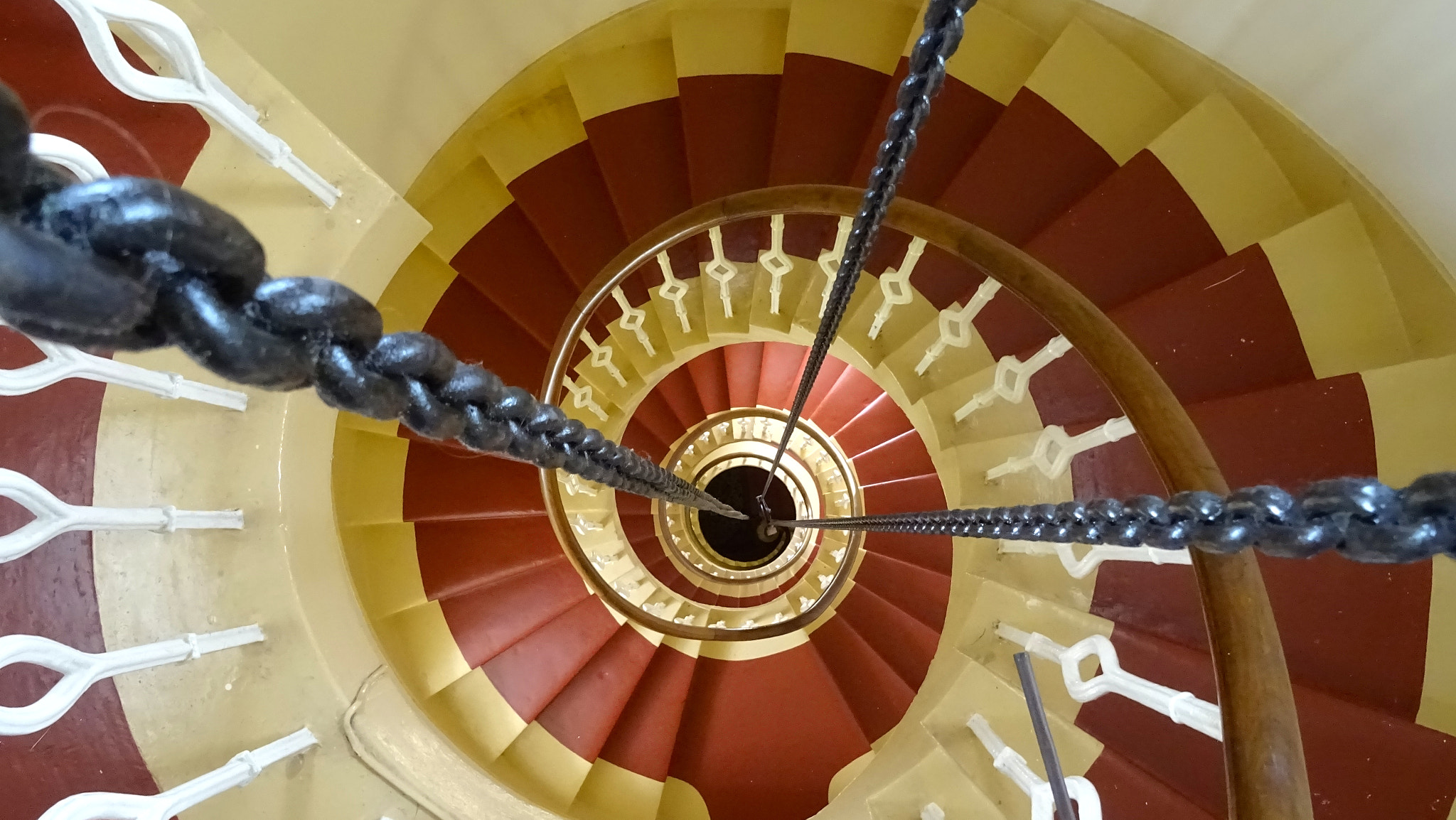 Sony 24-720mm F3.5-6.3 sample photo. Spirals in a lighthouse photography