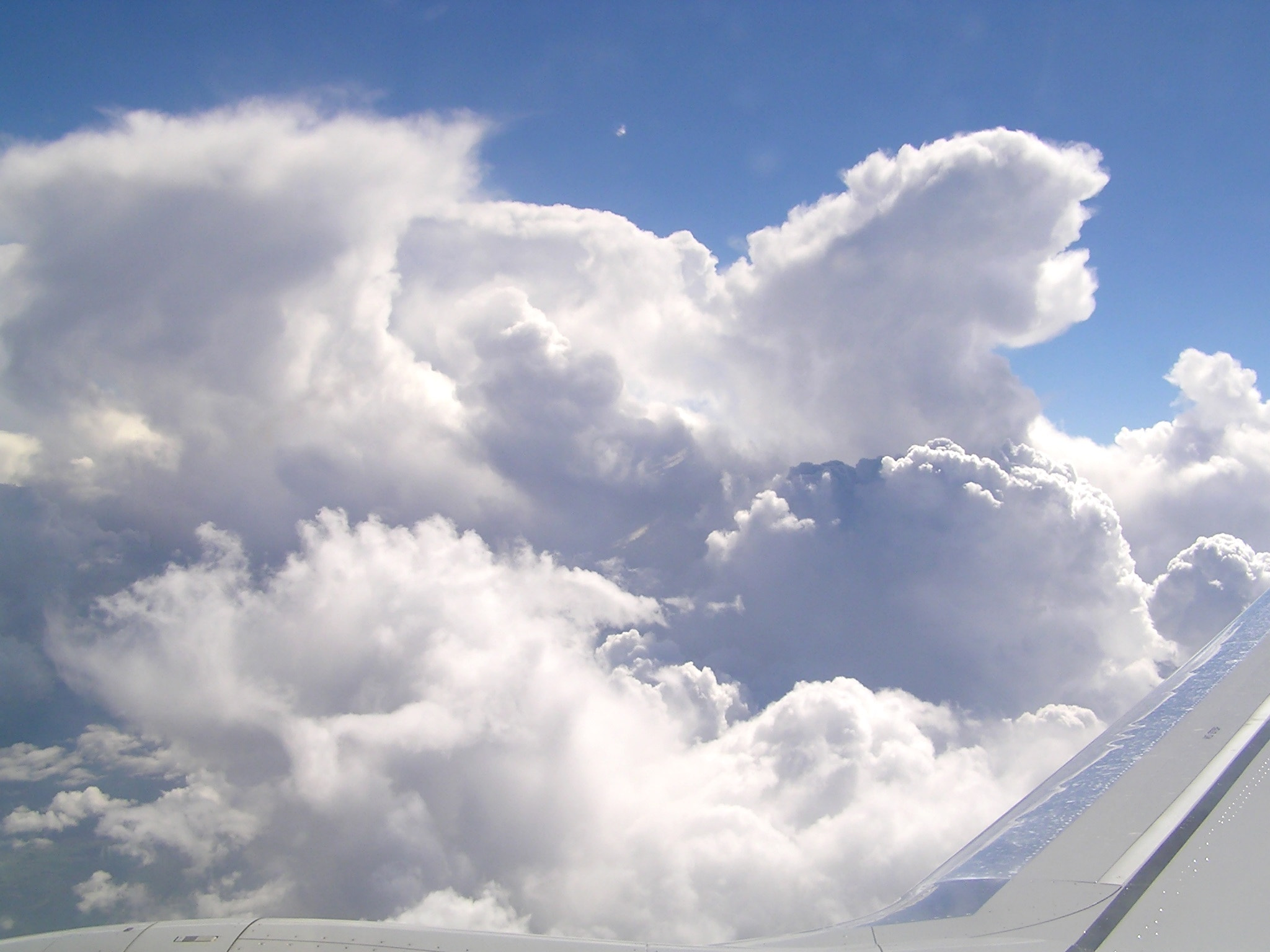 Olympus C760UZ sample photo. Top view to clouds from airplane photography