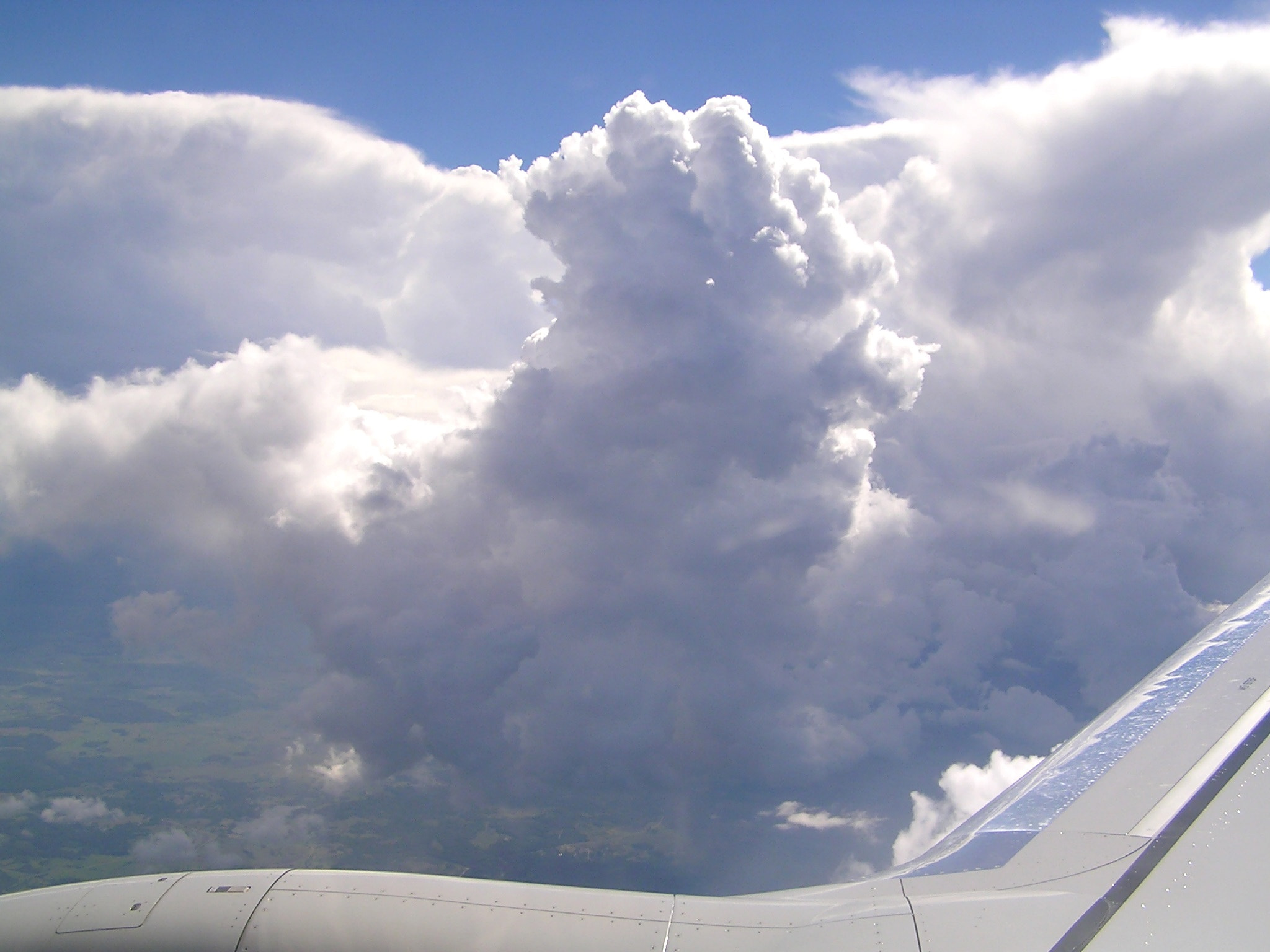 Olympus C760UZ sample photo. Top view to clouds from airplane photography