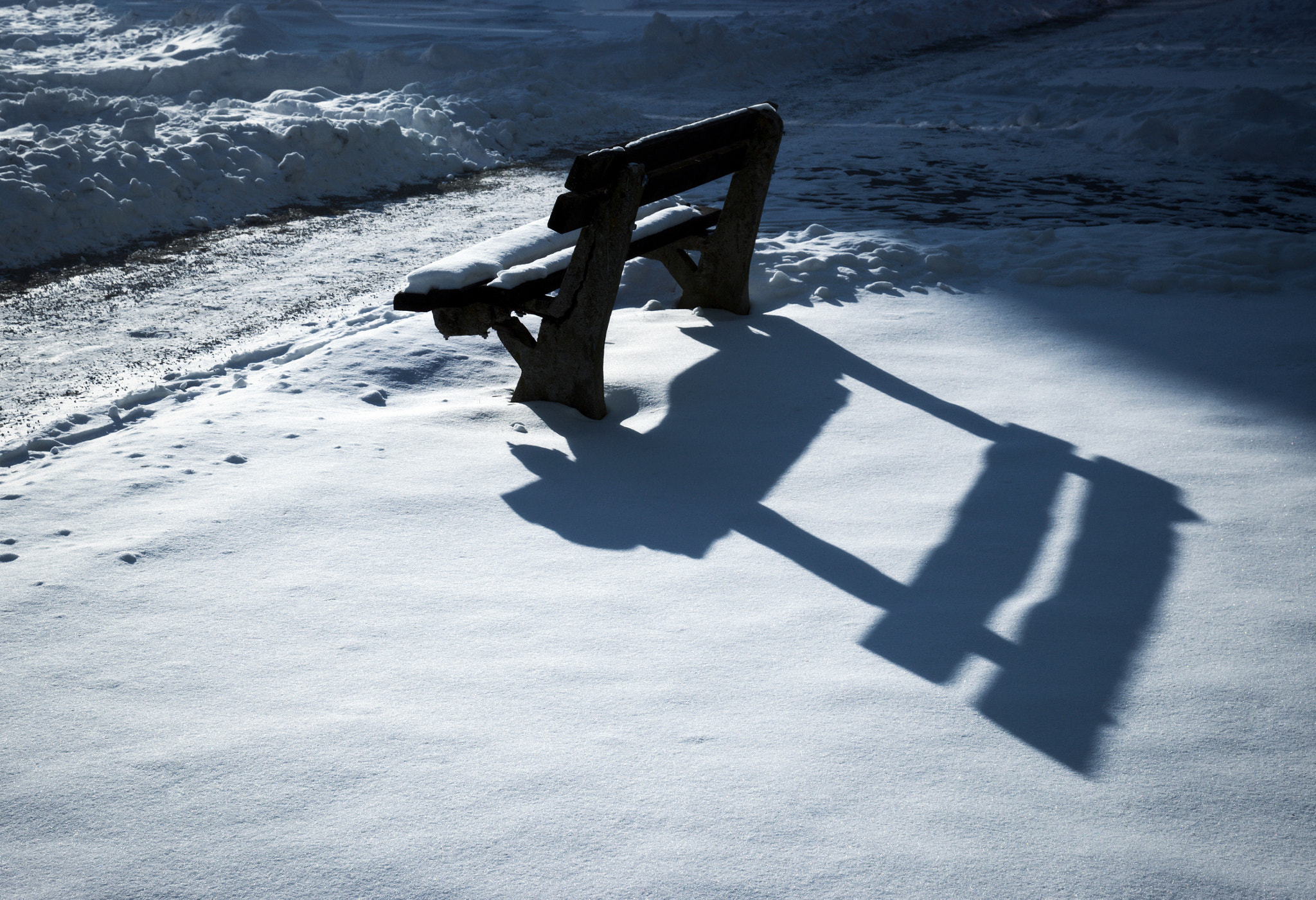 16.00 - 85.00 mm f/3.5 - 5.6 sample photo. Shadow on the bench early evening snow photography
