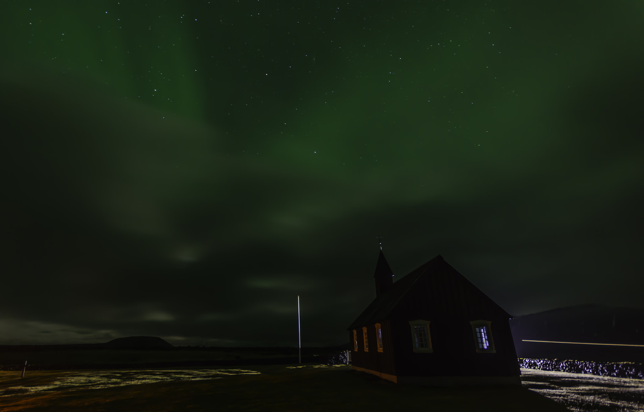 Sigma 10-20mm F4-5.6 EX DC HSM sample photo. Iceland black church with aurora photography