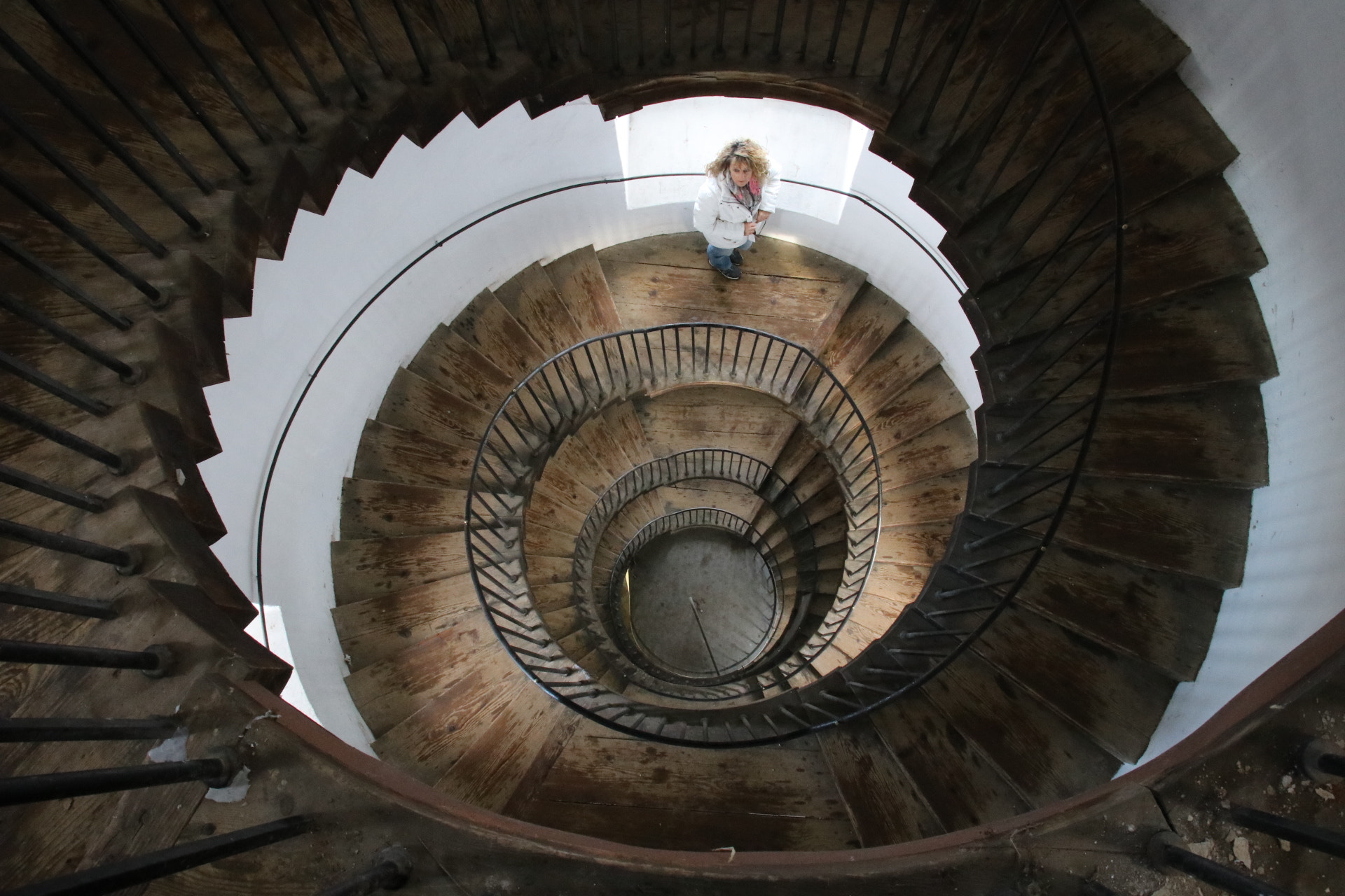 Canon EOS 80D sample photo. Spiral staircase inside an old tower photography