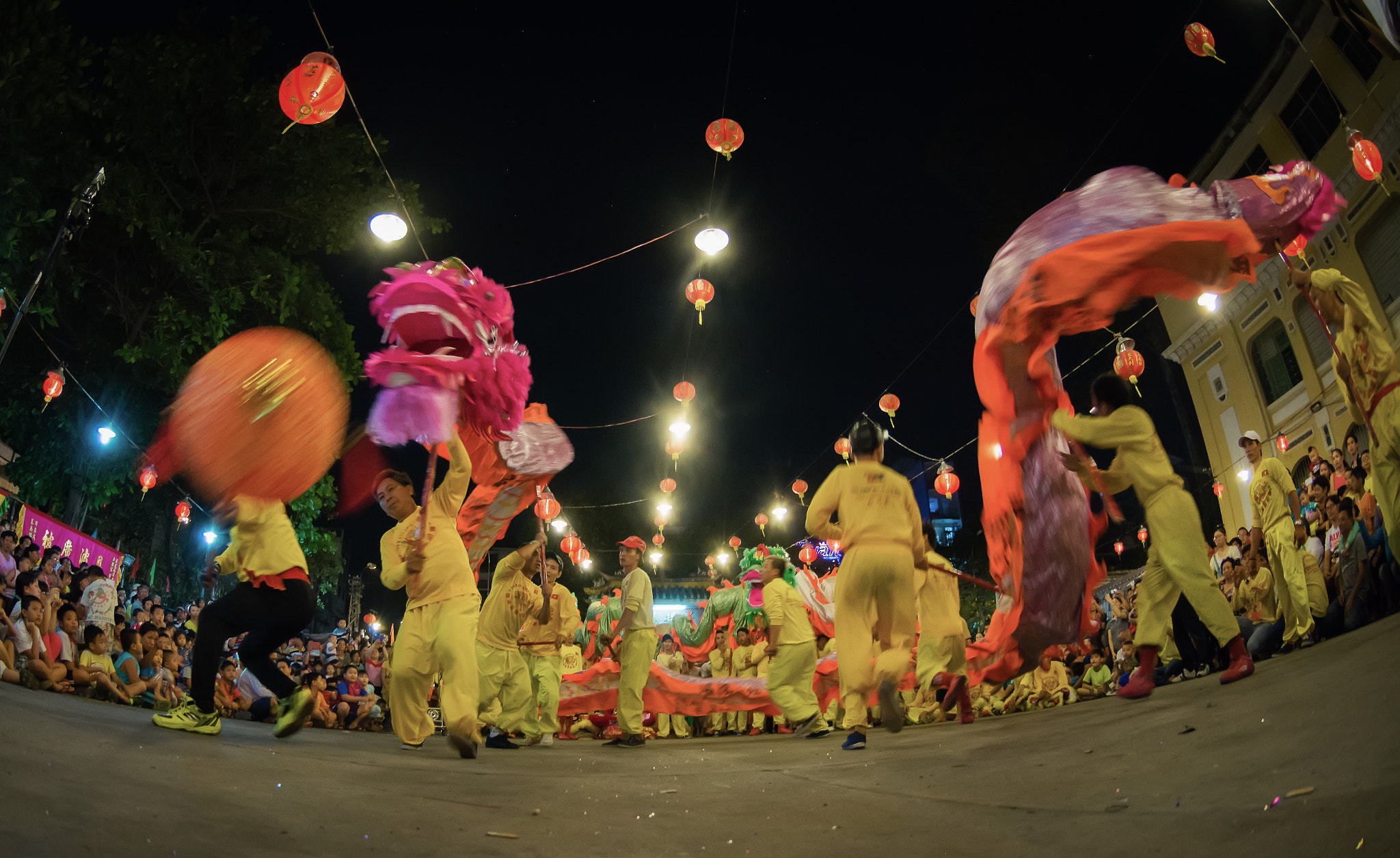 Nikon AF DX Fisheye-Nikkor 10.5mm F2.8G ED sample photo. Dragon dancers photography