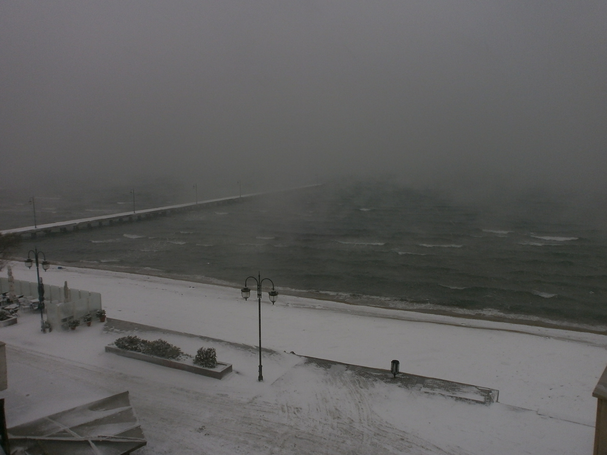 Olympus VG110,D700 sample photo. Snow storm and sea boilling photography