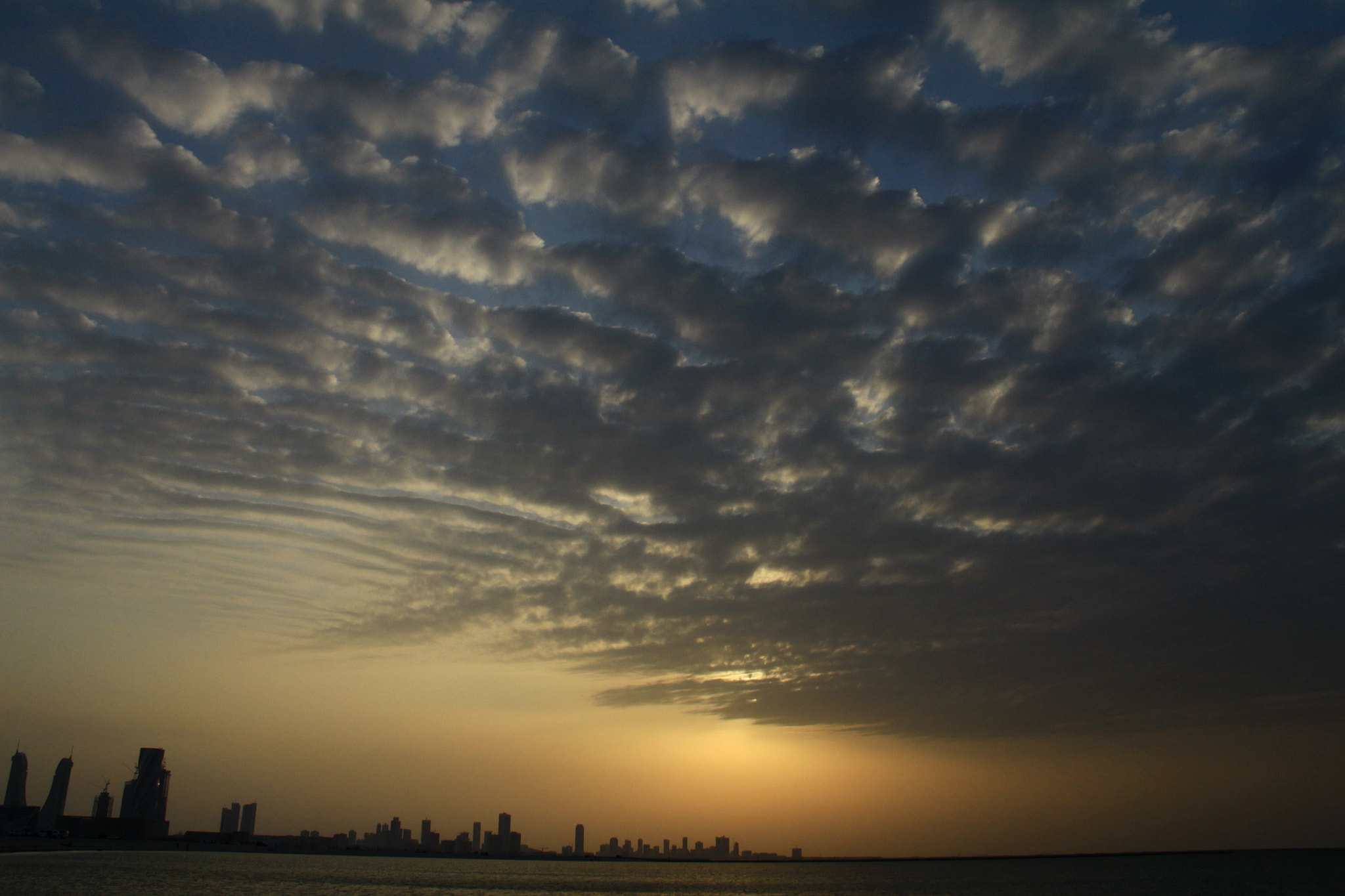 Canon EF-S 18-200mm F3.5-5.6 IS sample photo. Cloud pattern photography