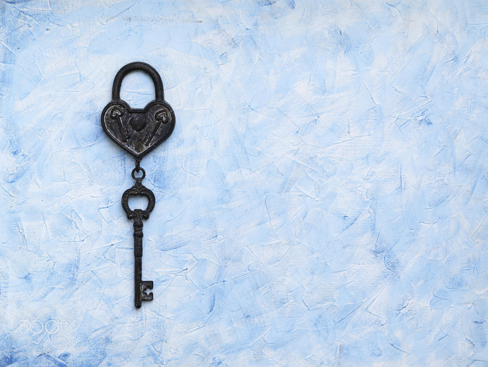 Nikon D7000 + Nikon AF-S DX Micro Nikkor 40mm F2.8 sample photo. Iron key from the lock lying on wooden vintage background, top view photography