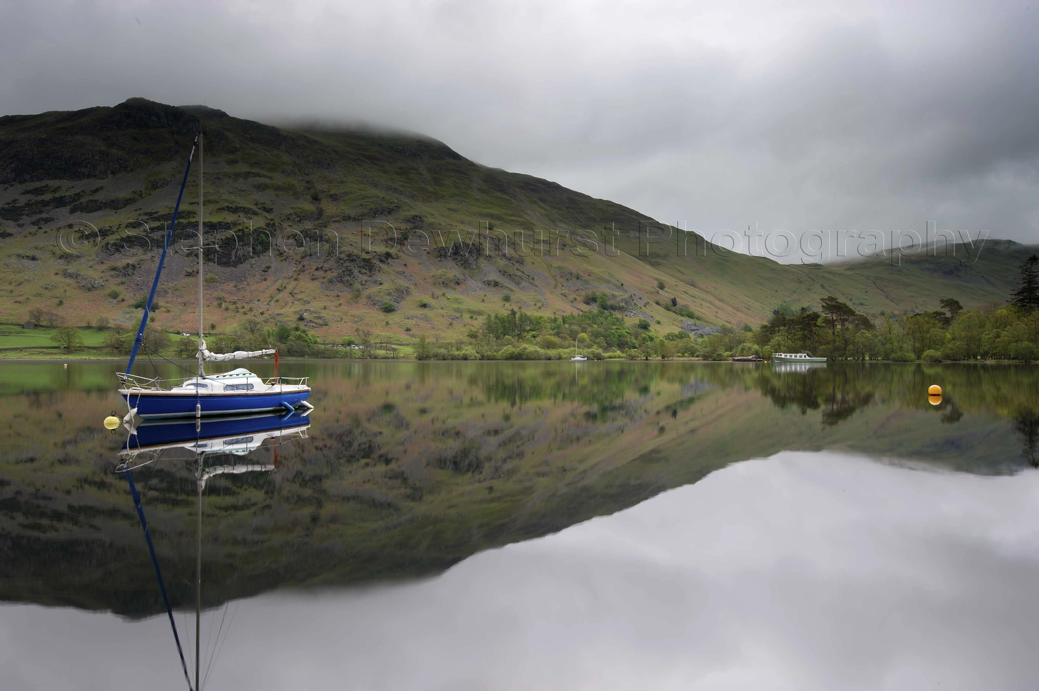 Nikon D3S + Nikon AF-S Nikkor 16-35mm F4G ED VR sample photo. Boats moored up on ullswater sat the lake district in cumbria. photography