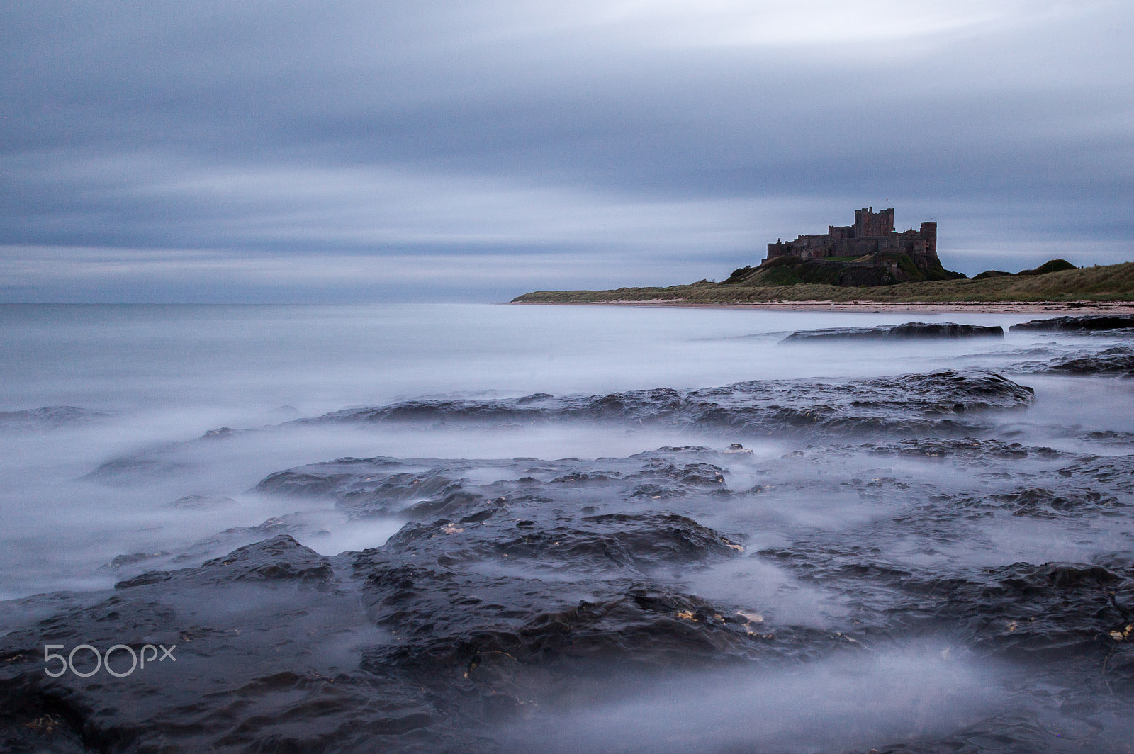 Canon EOS-1D Mark IV sample photo. Bamburgh castle at sunset photography