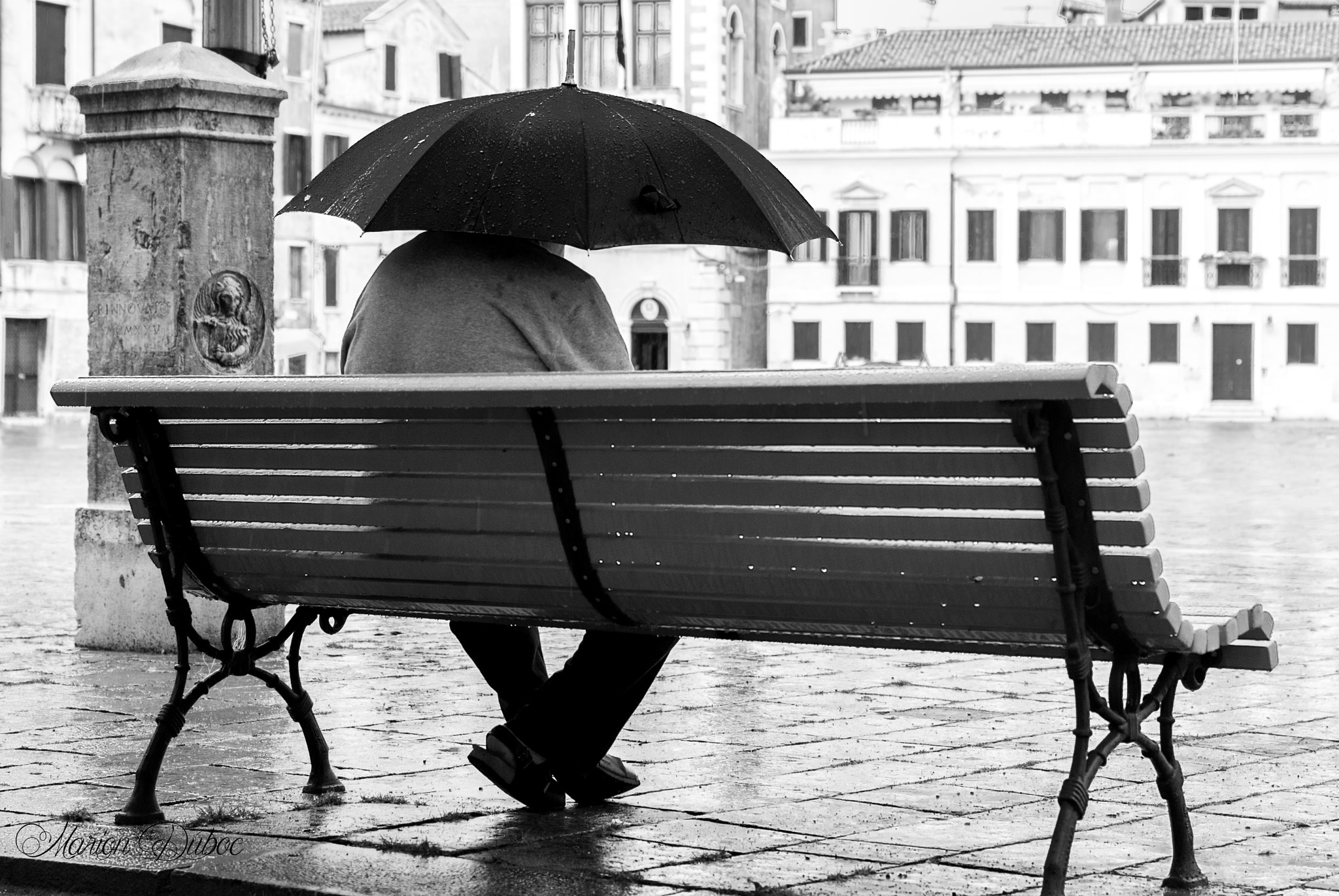 Nikon D80 + Sigma 50mm F2.8 EX DG Macro sample photo. Man in the rain photography