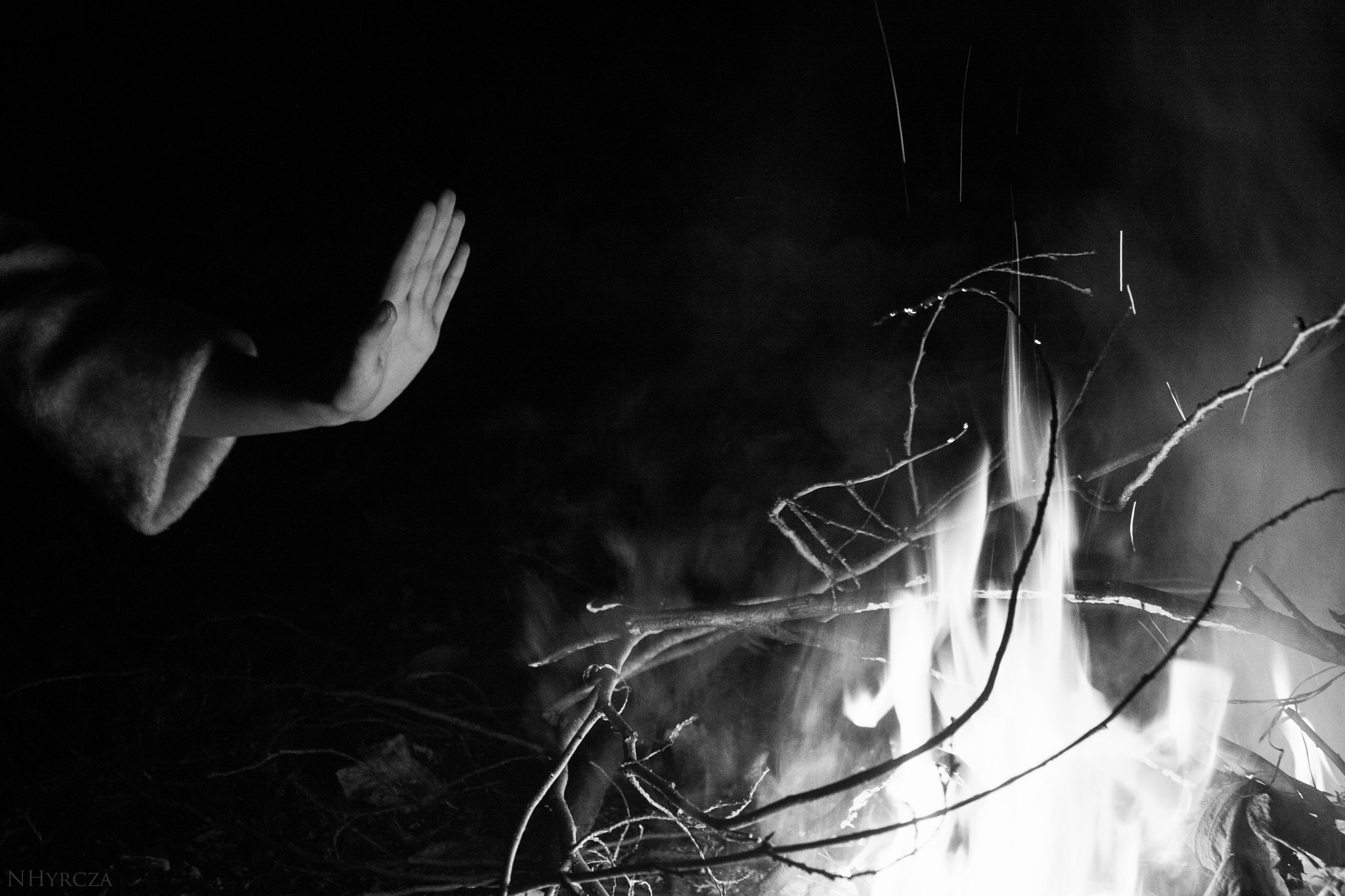 Canon EOS 40D + Canon EF-S 18-55mm F3.5-5.6 IS II sample photo. Hand and fire photography