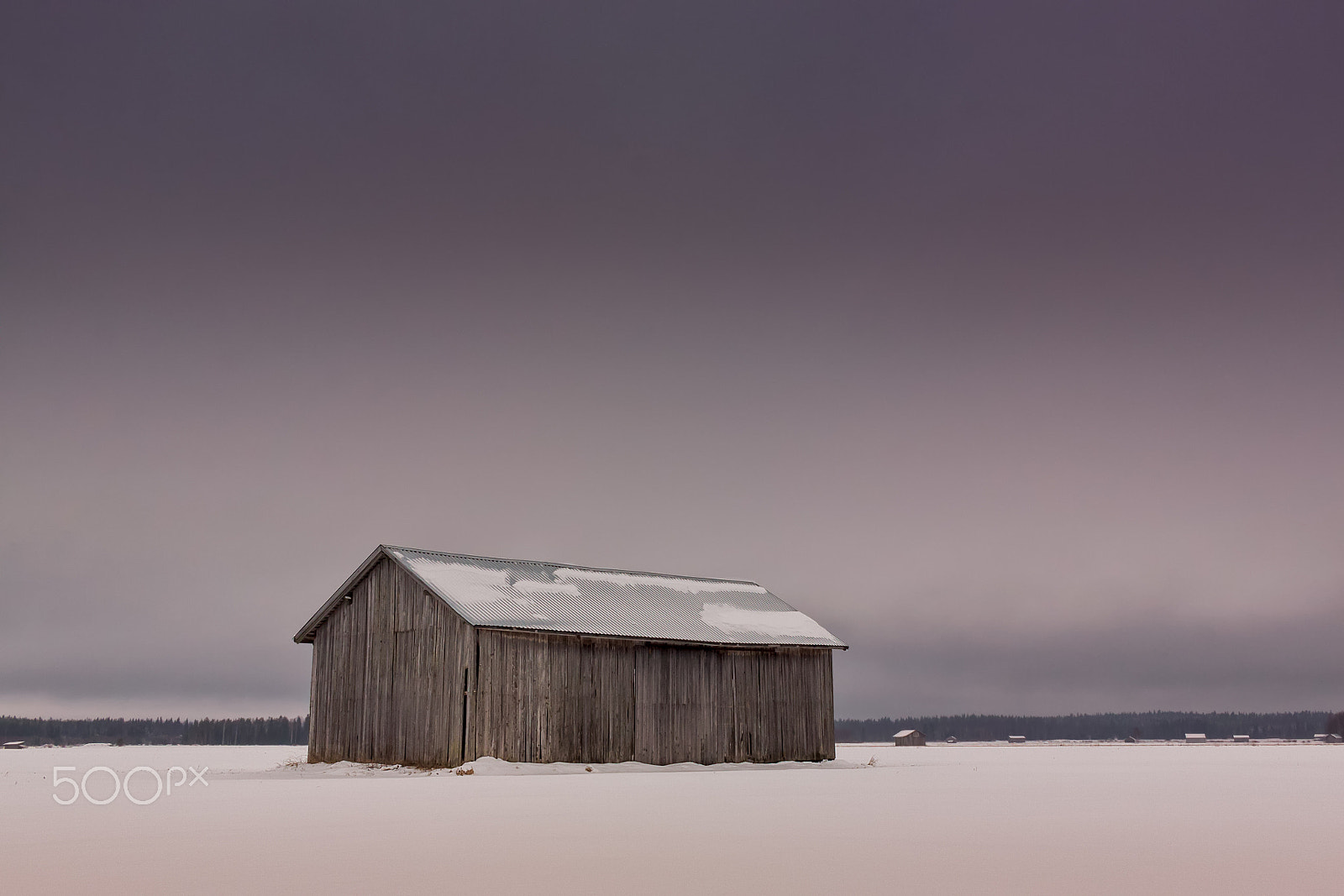 Canon EF-S 24mm F2.8 STM sample photo. Heavy clouds over the snowy fields photography