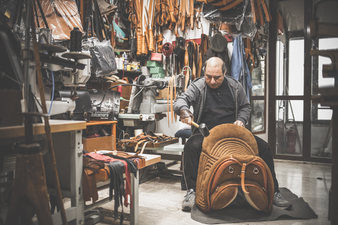 Canon EF 35mm F2 IS USM sample photo. Saddle maker. thick fog outside, wisdom inside. photography