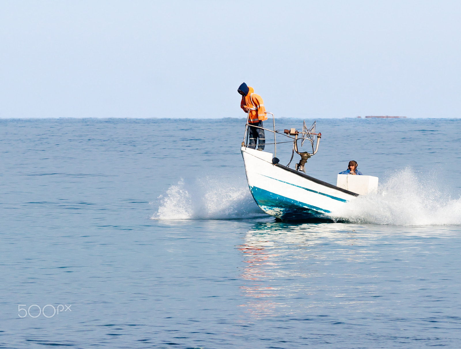 Canon EOS 80D sample photo. Fishermen patrol on boat and looking for fish photography