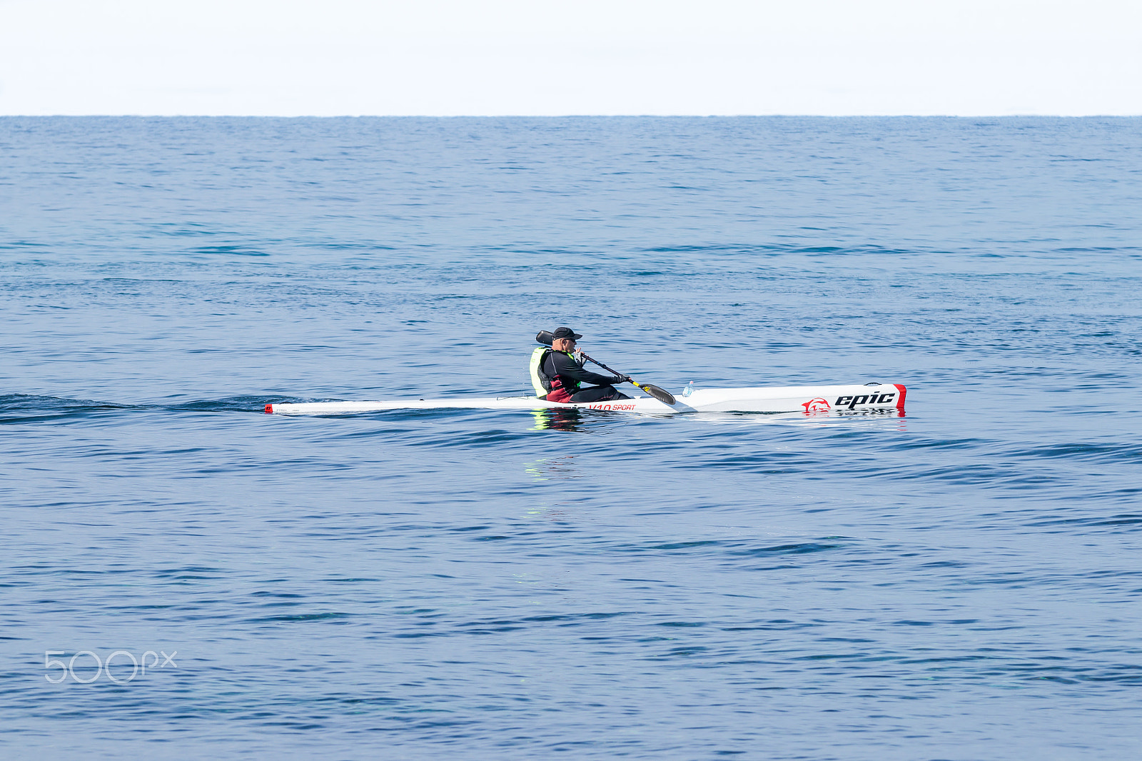 Canon EOS 80D + Sigma 50-200mm F4-5.6 DC OS HSM sample photo. Athlete training on kayak winter morning on sea near coast photography
