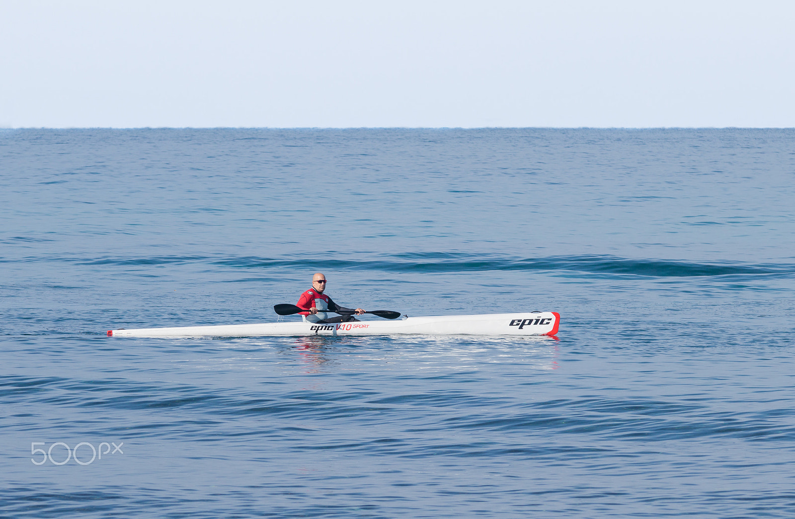 Canon EOS 80D sample photo. Athlete training on kayak winter morning on sea near coast photography