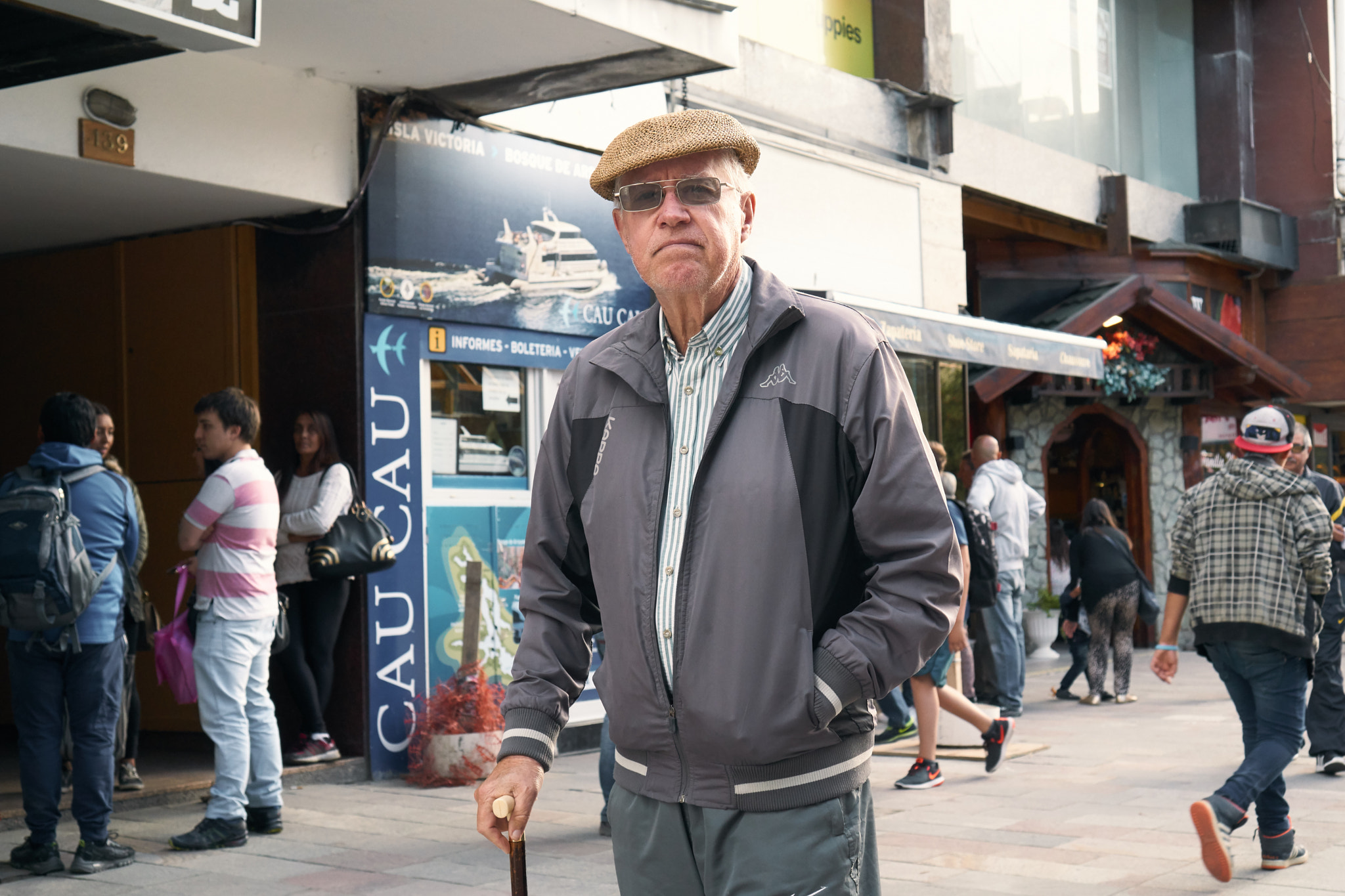 Sony E 35mm F1.8 OSS sample photo. Man walking with cane photography