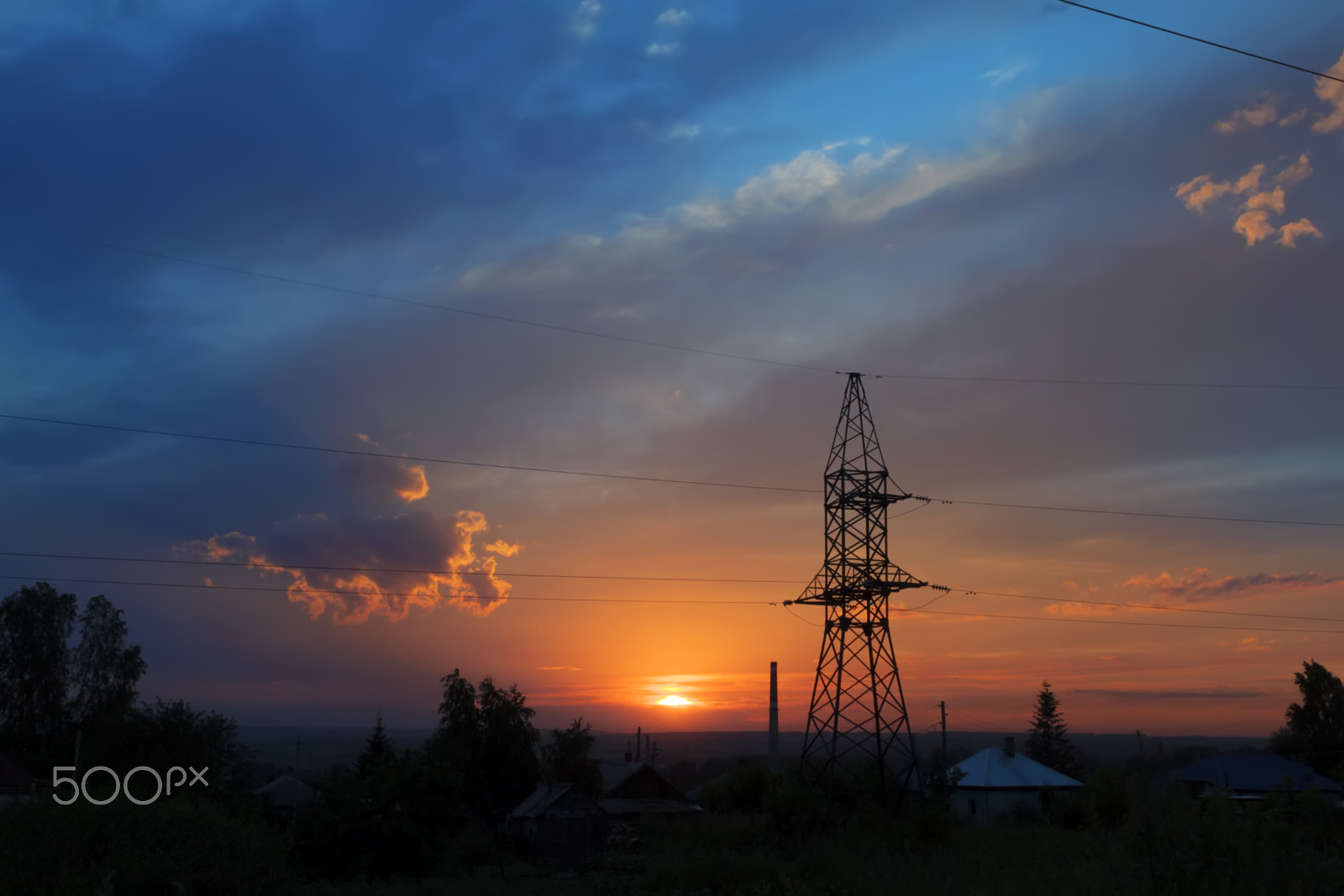 Canon EOS 500D (EOS Rebel T1i / EOS Kiss X3) + Sigma 24-70mm F2.8 EX DG Macro sample photo. Sunset beneath the power lines photography