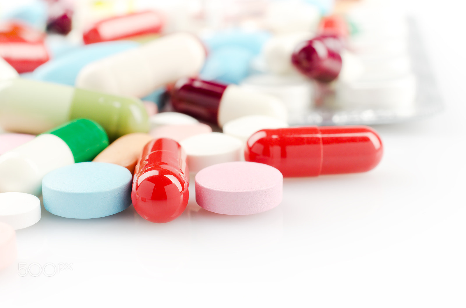 Nikon AF-S DX Micro Nikkor 40mm F2.8 sample photo. Multicolored pills and capsules photography