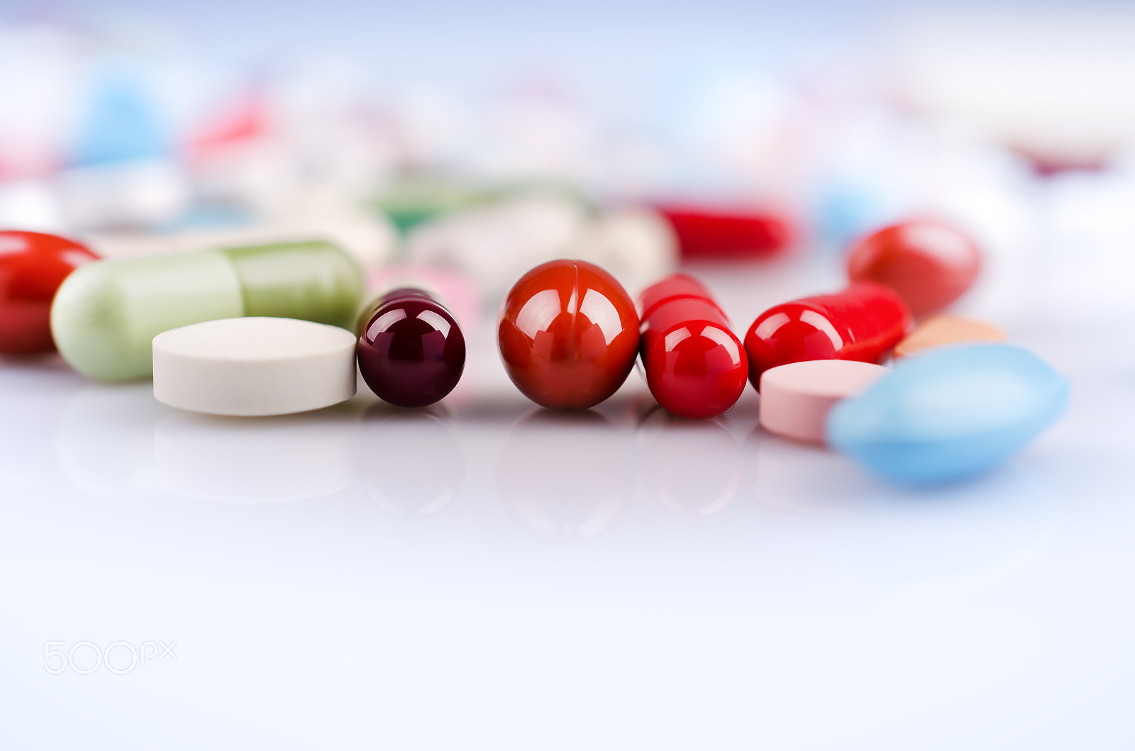 Nikon AF-S DX Micro Nikkor 40mm F2.8 sample photo. Multicolored pills and capsules photography