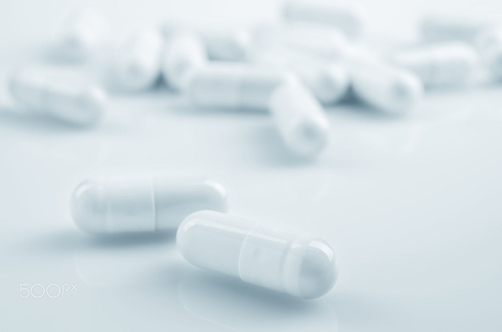Nikon AF-S DX Micro Nikkor 40mm F2.8 sample photo. White medicine antibiotic pills. photography
