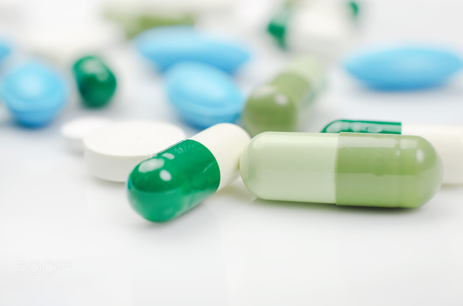 Nikon AF-S DX Micro Nikkor 40mm F2.8 sample photo. Blue and green pills photography