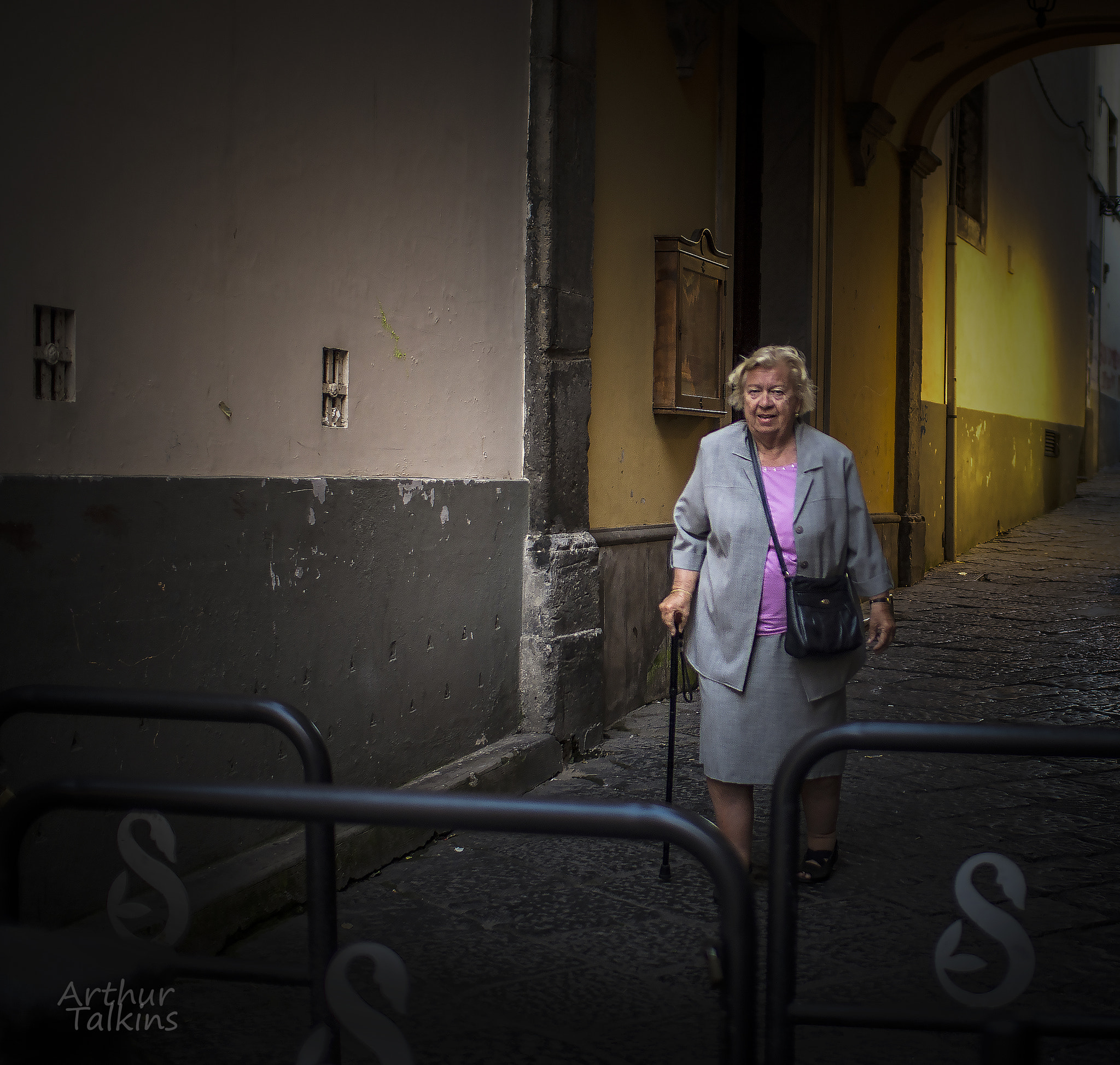 Pentax K-5 sample photo. Streets of europe...a woman shuffles along.... photography