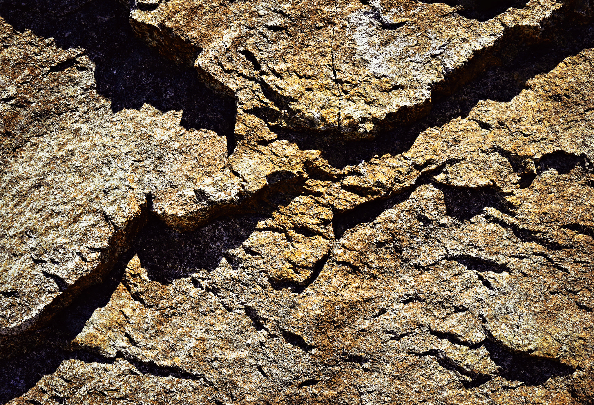 Nikon D5500 sample photo. Shadows liven up the granite rock photography