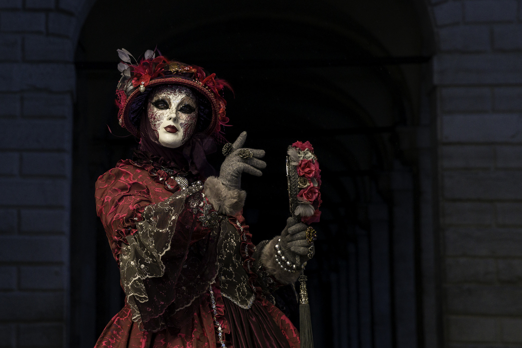 Sony a7R II + Canon EF 24-70mm F2.8L II USM sample photo. Lady in red - masked performer at venice carnival photography
