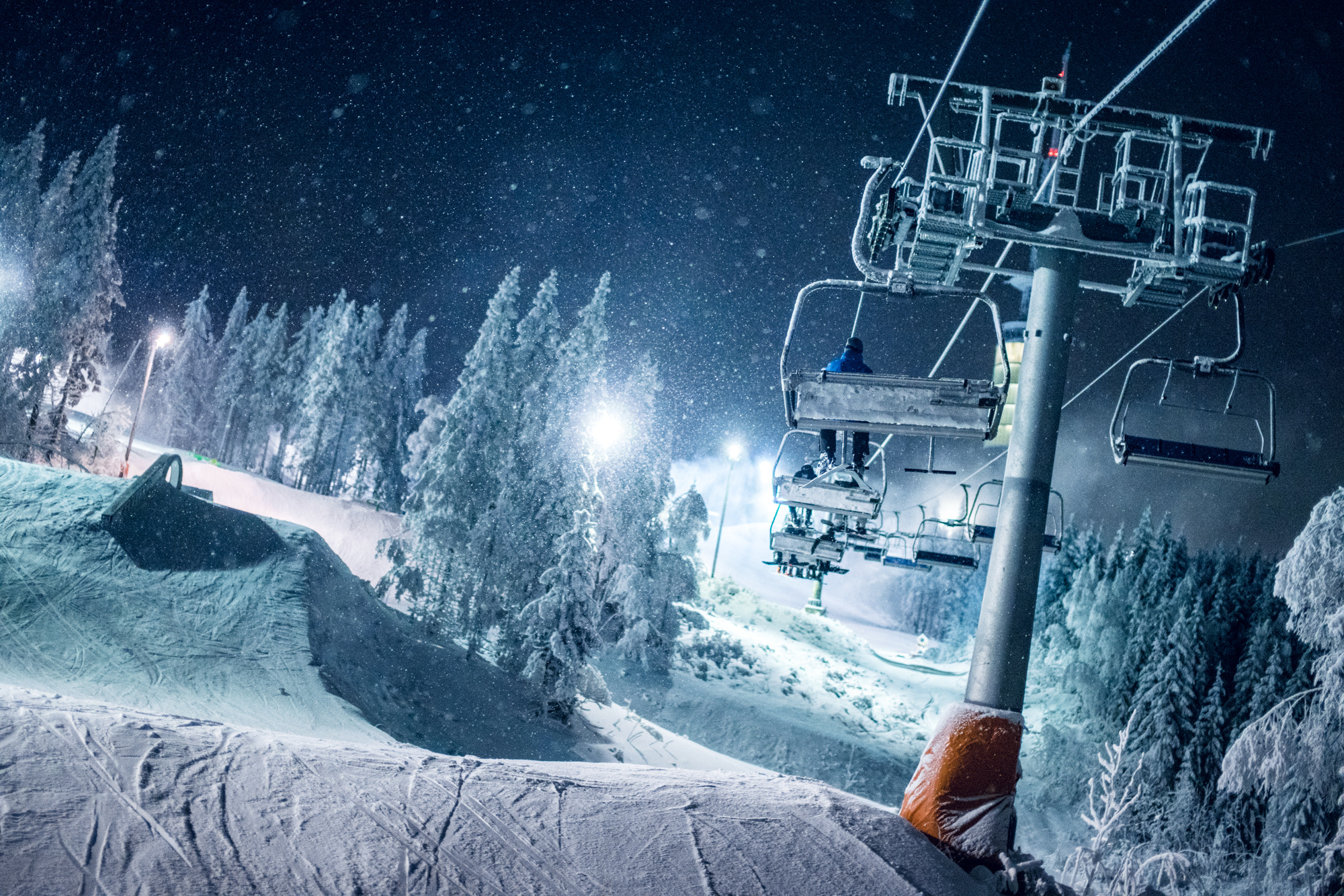 Sony a99 II sample photo. Snowy chairlift ride photography