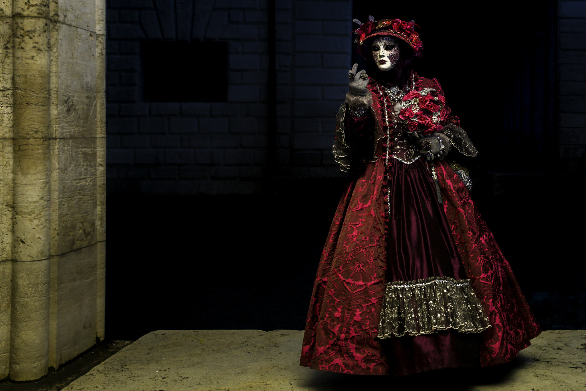 Sony a7R II + Canon EF 24-70mm F2.8L II USM sample photo. Lady in red - masked performer at venice carnival photography