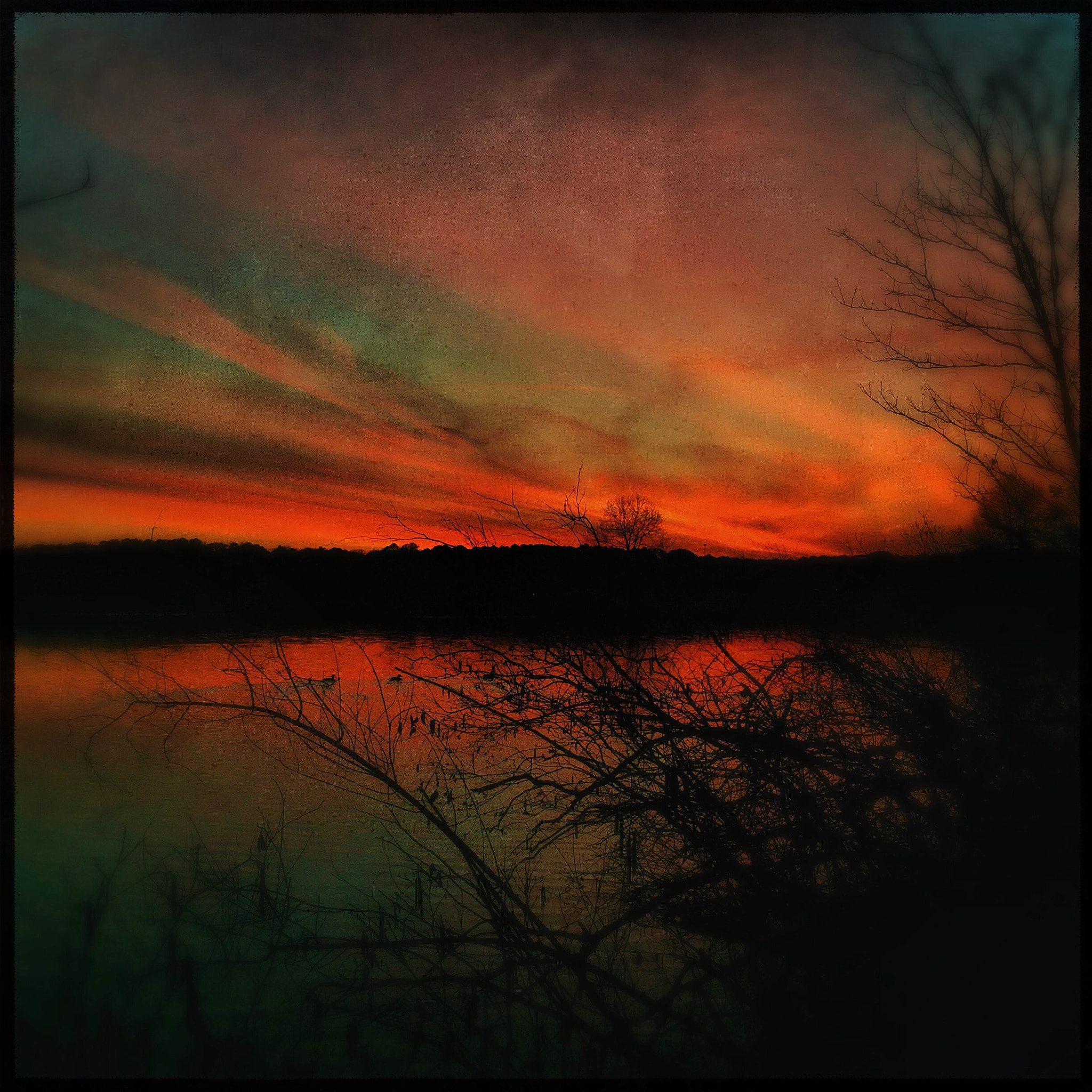 Hipstamatic 331 sample photo. A fiery sunset photography