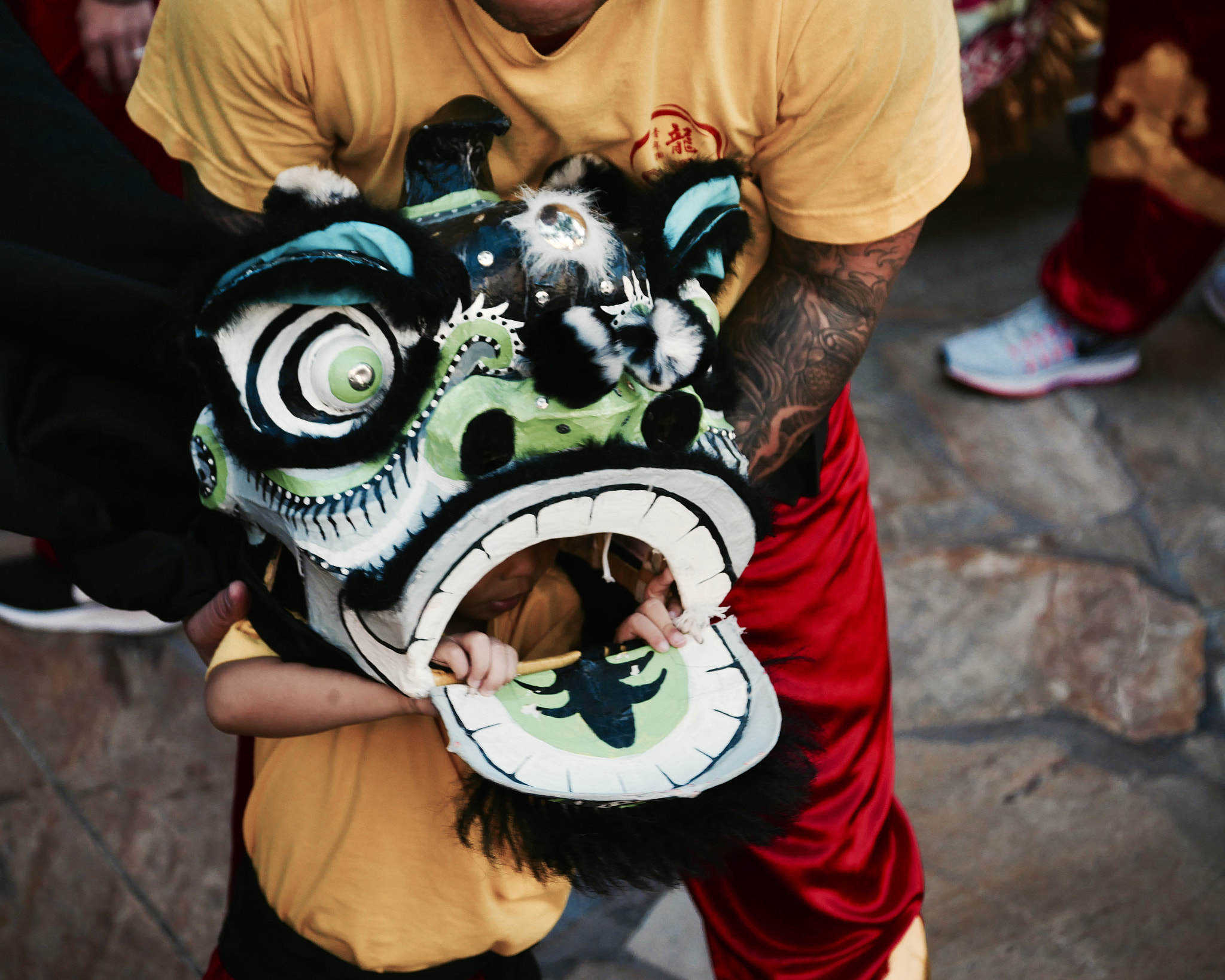Panasonic Lumix G X Vario 35-100mm F2.8 OIS sample photo. Chinese new year kid lion dance or mini dragon dance at waikiki honolulu hawaii 2017 photography