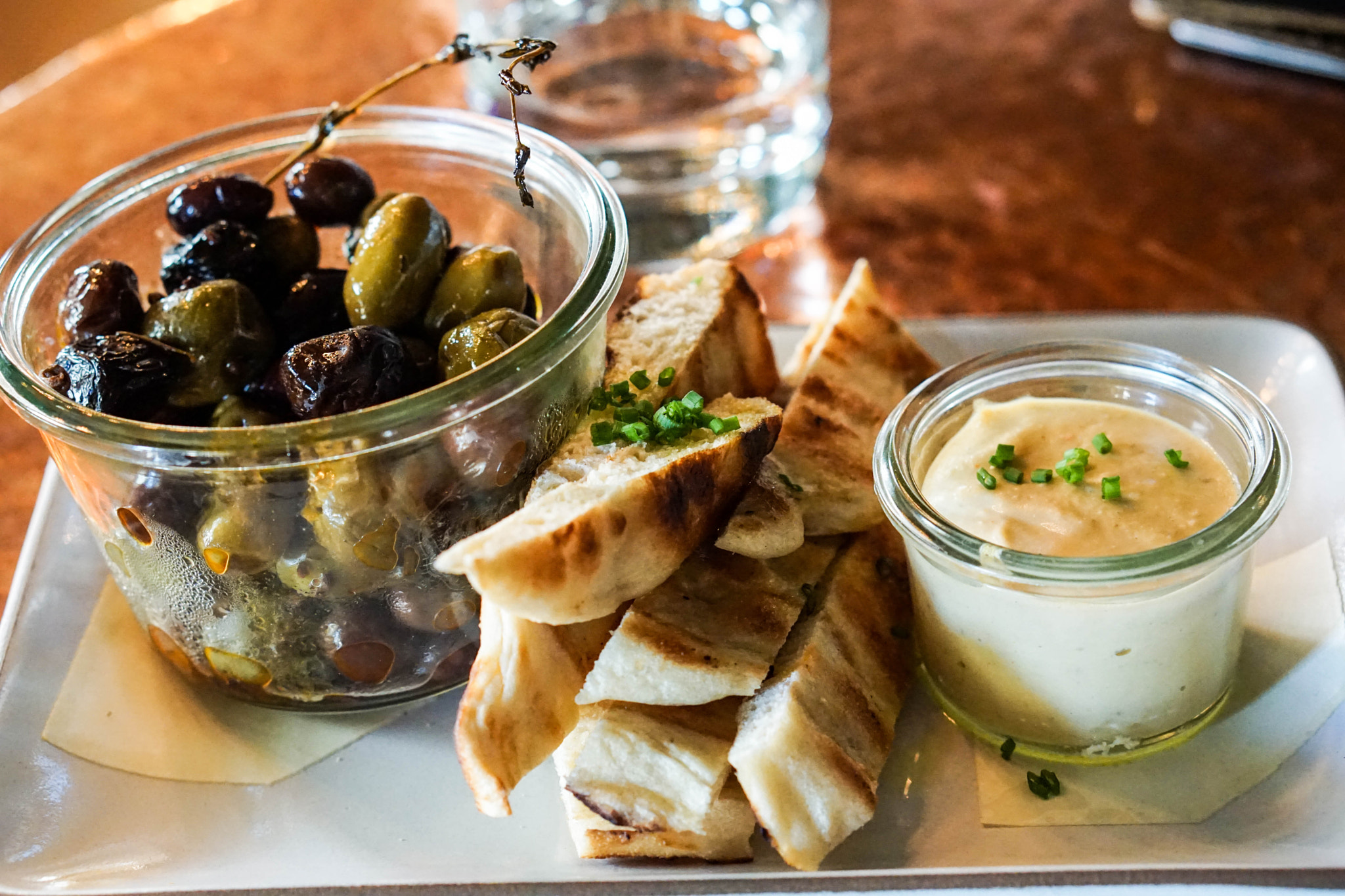 E 50mm F1.8 OSS sample photo. Olives & bread photography