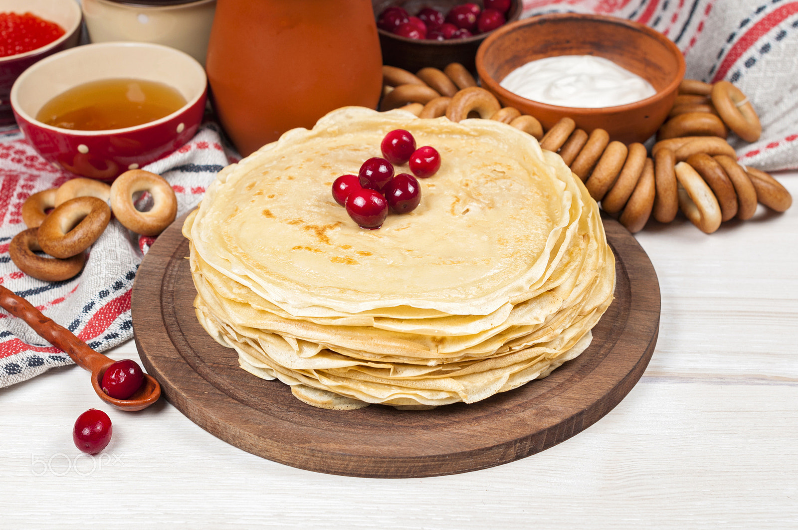 Nikon D5000 + Nikon AF-S Nikkor 50mm F1.4G sample photo. Russian pancake blini on white wooden background photography