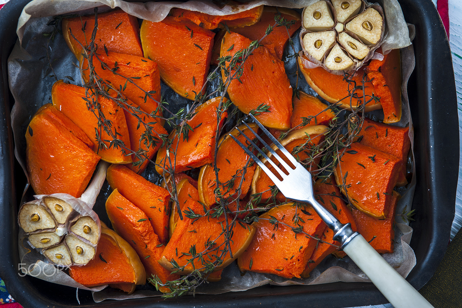 Nikon D700 sample photo. Baked pumpkin with thyme, olive oil and garlic photography