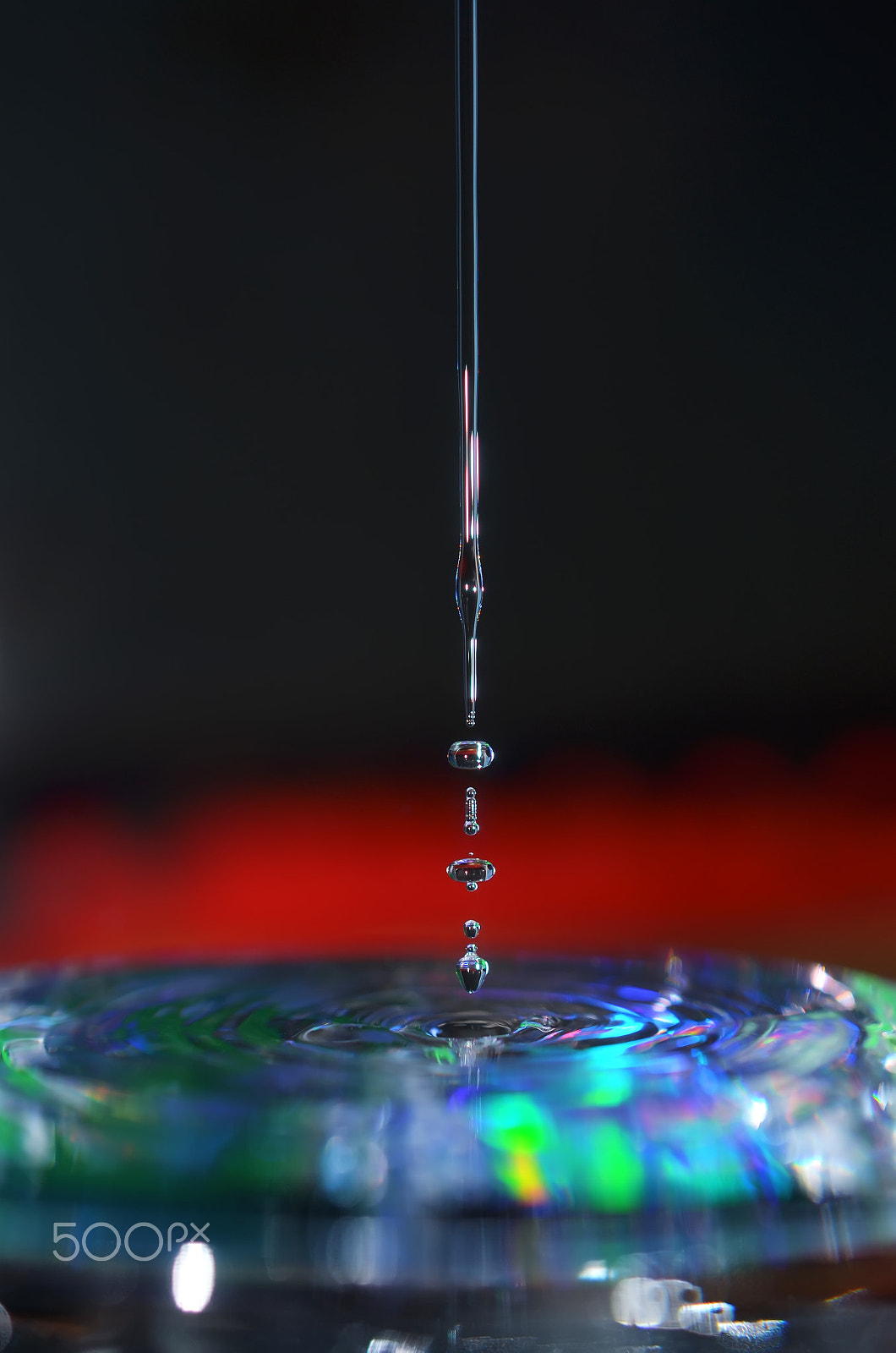 Nikon AF-S DX Micro Nikkor 40mm F2.8 sample photo. Frozen water jet photography