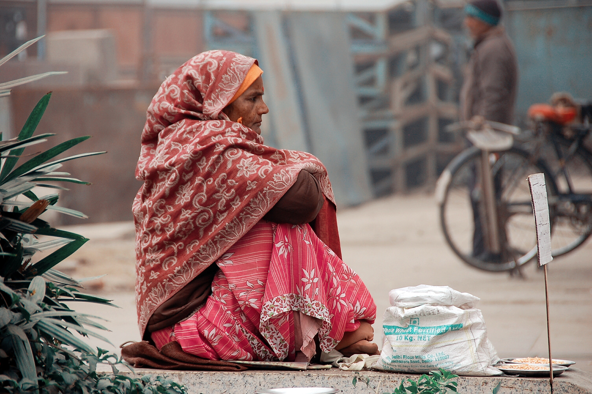 Nikon D50 sample photo. Woman seling something...  photography