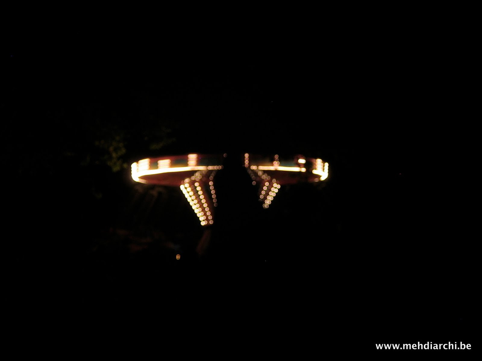 Canon DIGITAL IXUS 40 sample photo. Dark carrousel photography