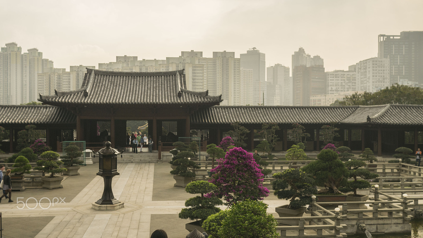 Panasonic Lumix DMC-GX7 sample photo. Temple in the middle of a city photography