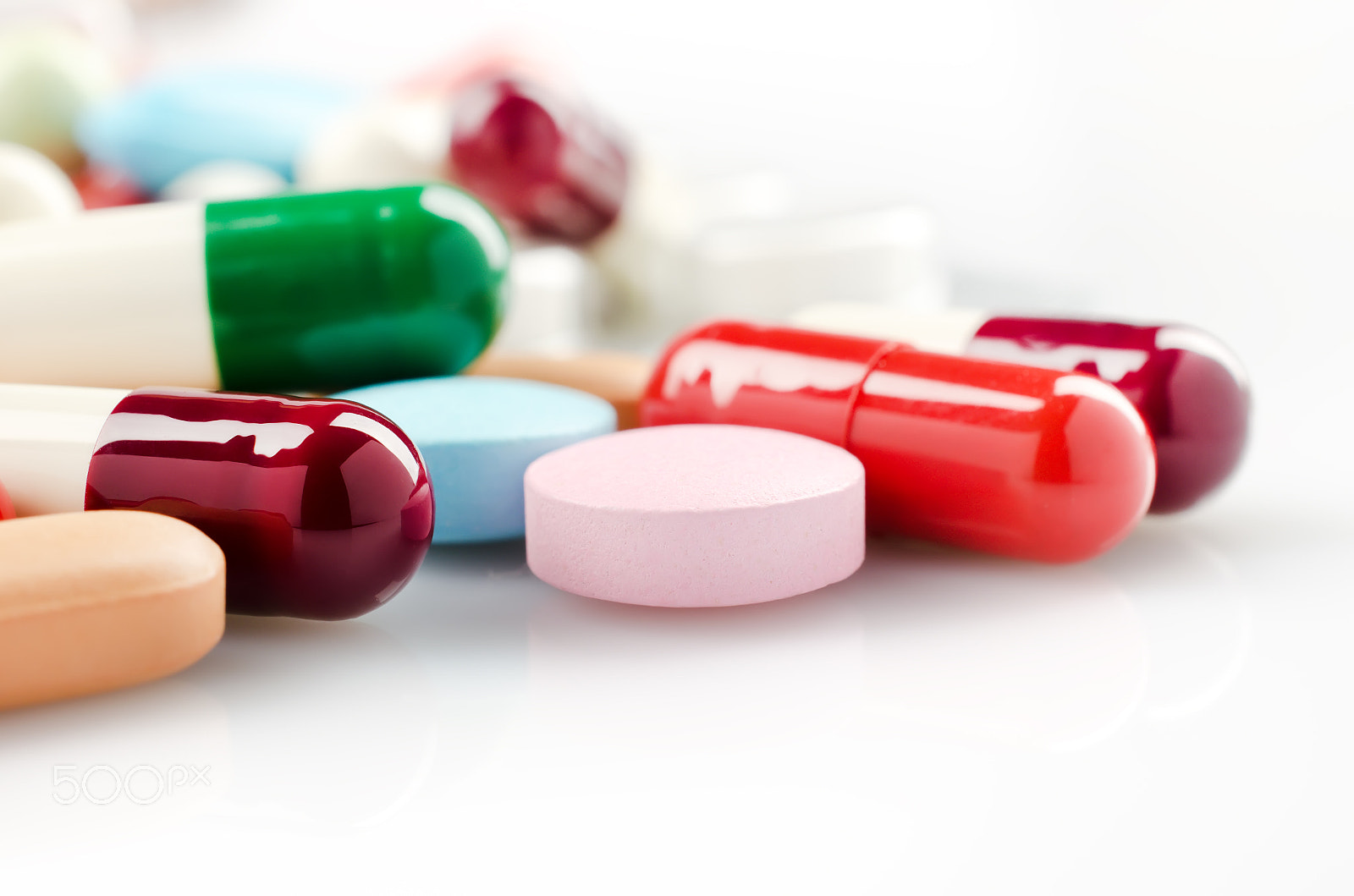 Nikon AF-S DX Micro Nikkor 40mm F2.8 sample photo. Multicolored pills and capsules photography
