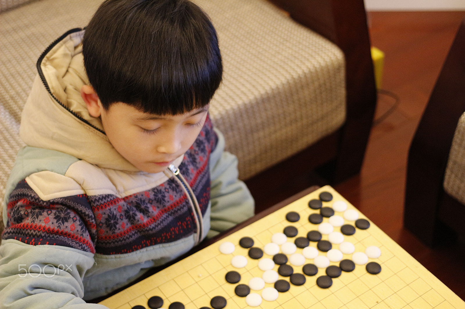 Canon EOS 100D (EOS Rebel SL1 / EOS Kiss X7) + Canon EF 40mm F2.8 STM sample photo. Playing go photography