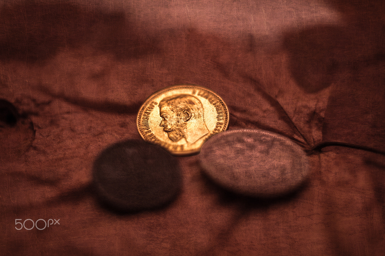 Canon EF 35-80mm f/4-5.6 sample photo. Gloss of an old gold coin photography