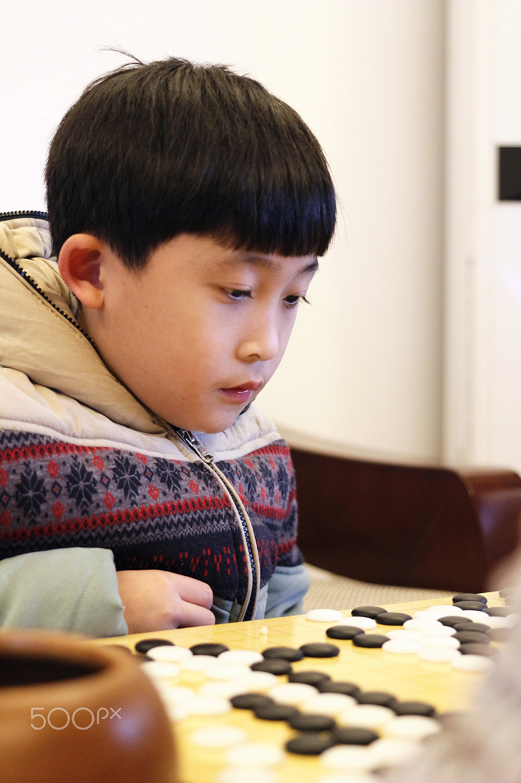Canon EOS 100D (EOS Rebel SL1 / EOS Kiss X7) + Canon EF 40mm F2.8 STM sample photo. Playing go photography