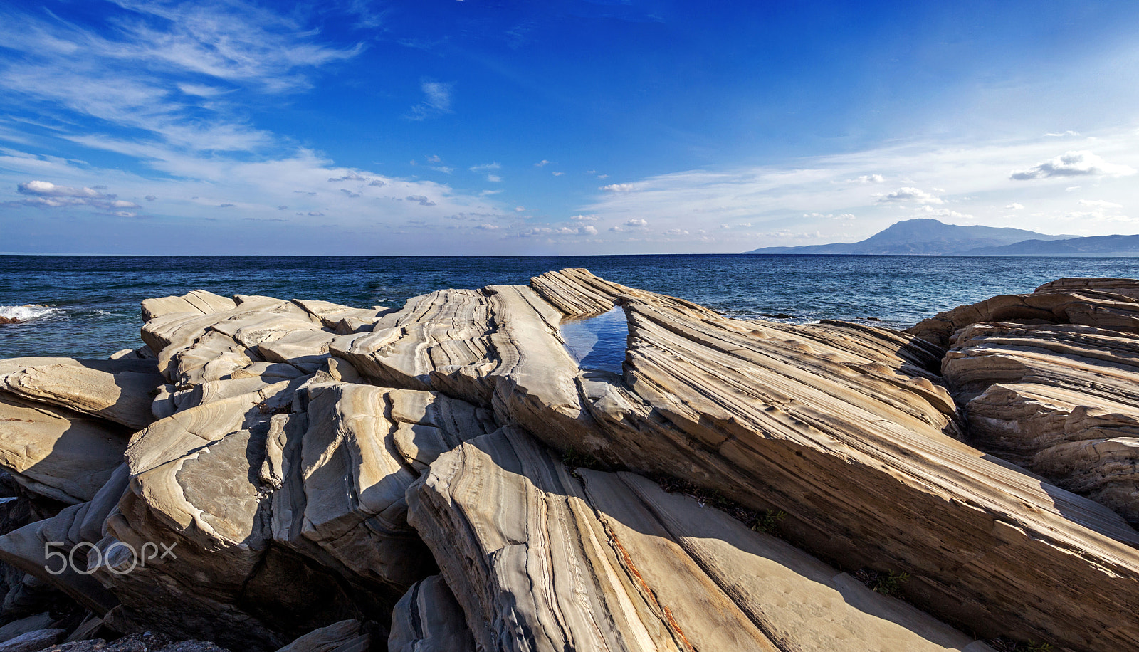 Canon EOS 650D (EOS Rebel T4i / EOS Kiss X6i) + Sigma 18-50mm f/2.8 Macro sample photo. Reflection in the rock, greece photography