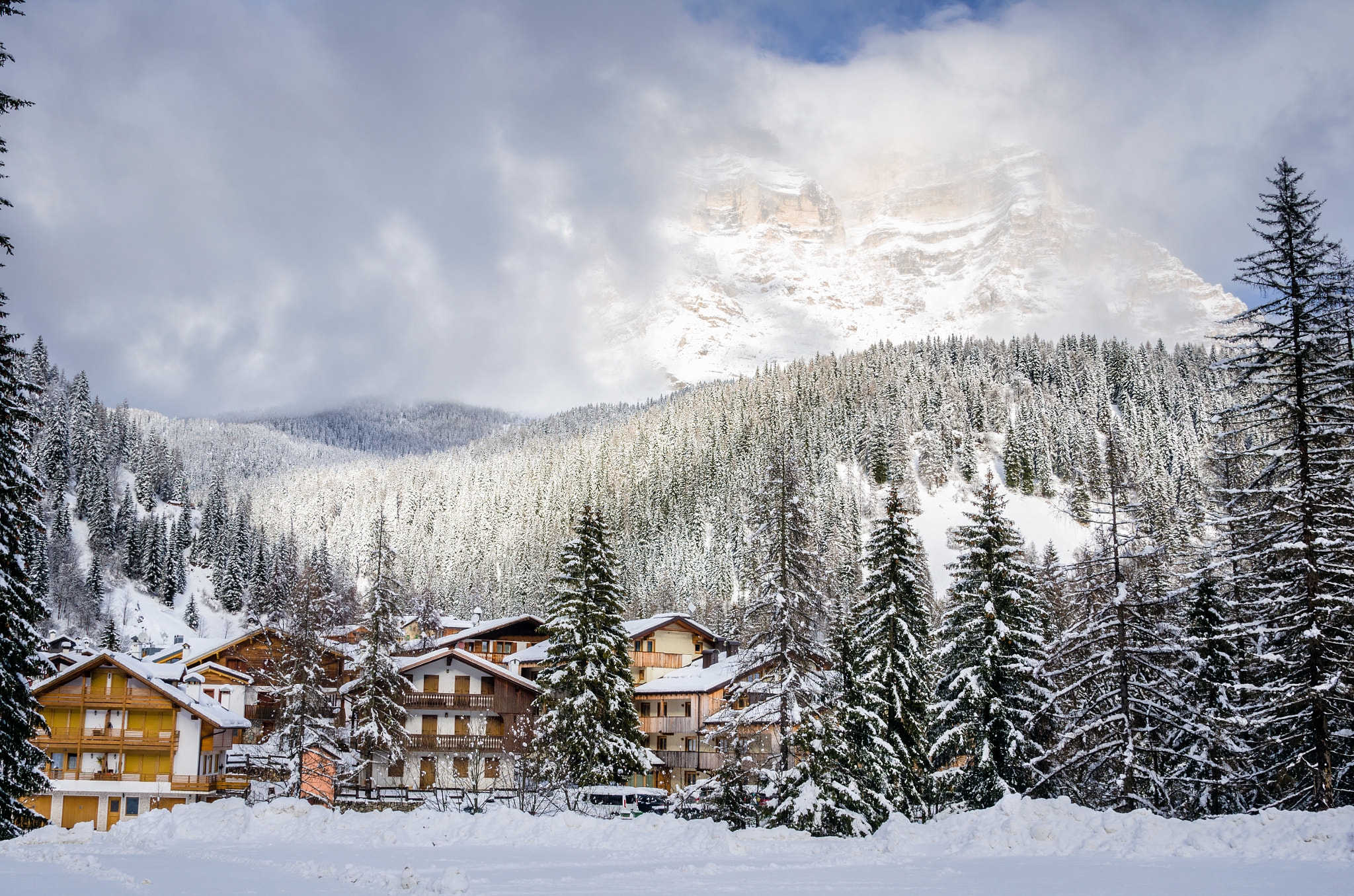 Nikon AF-S Nikkor 24-120mm F4G ED VR sample photo. Mountain village covered in snow photography