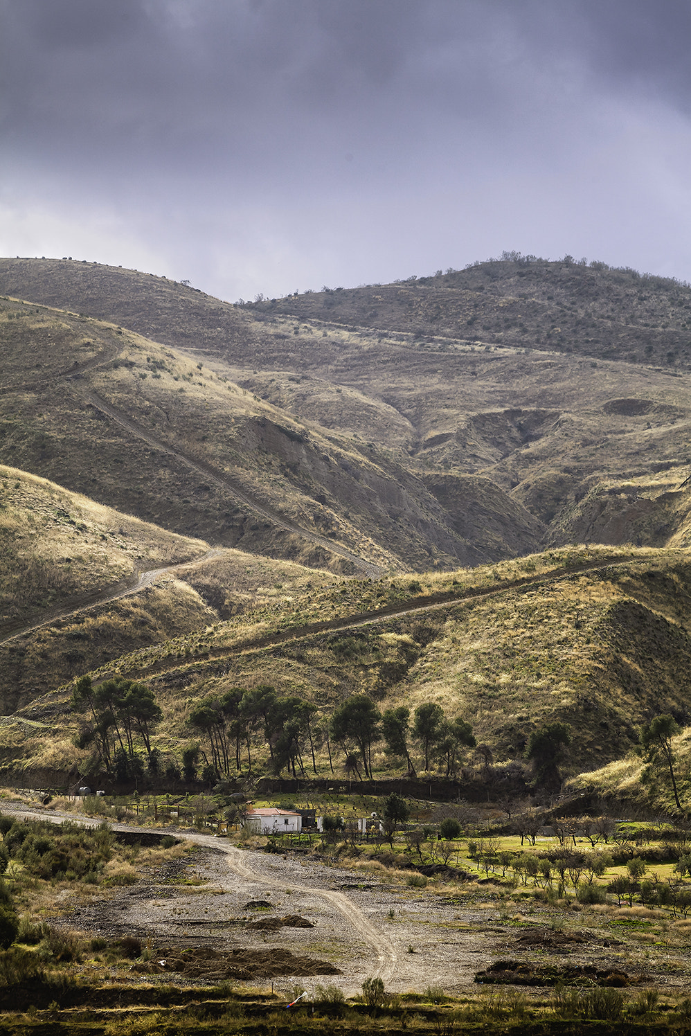 Canon EF 70-300mm F4-5.6 IS USM sample photo. Mountains and a road photography