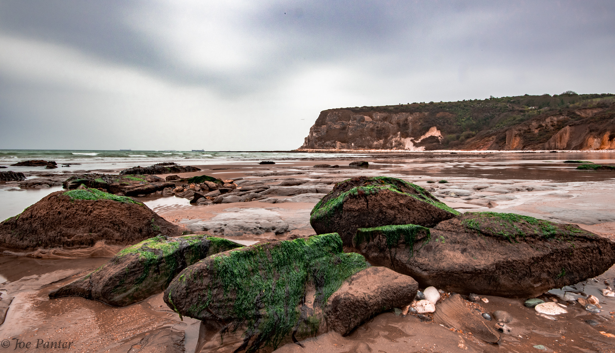 Sigma 10-20mm F4-5.6 EX DC HSM sample photo. A pebbles beach photography