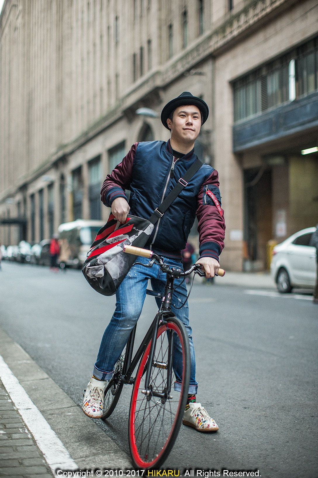 Canon EOS-1D X + Canon EF 50mm F1.2L USM sample photo. Portrait of fashionable man riding bike photography
