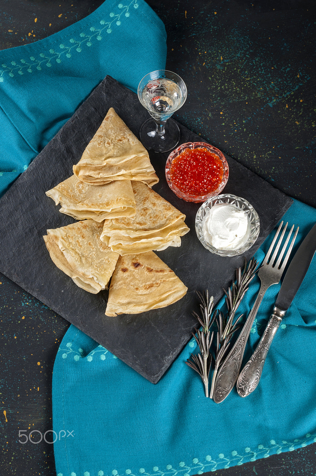 Nikon D5000 + Nikon AF-S Nikkor 50mm F1.4G sample photo. Russian pancake blini with fresh cream and red caviar on dark ba photography