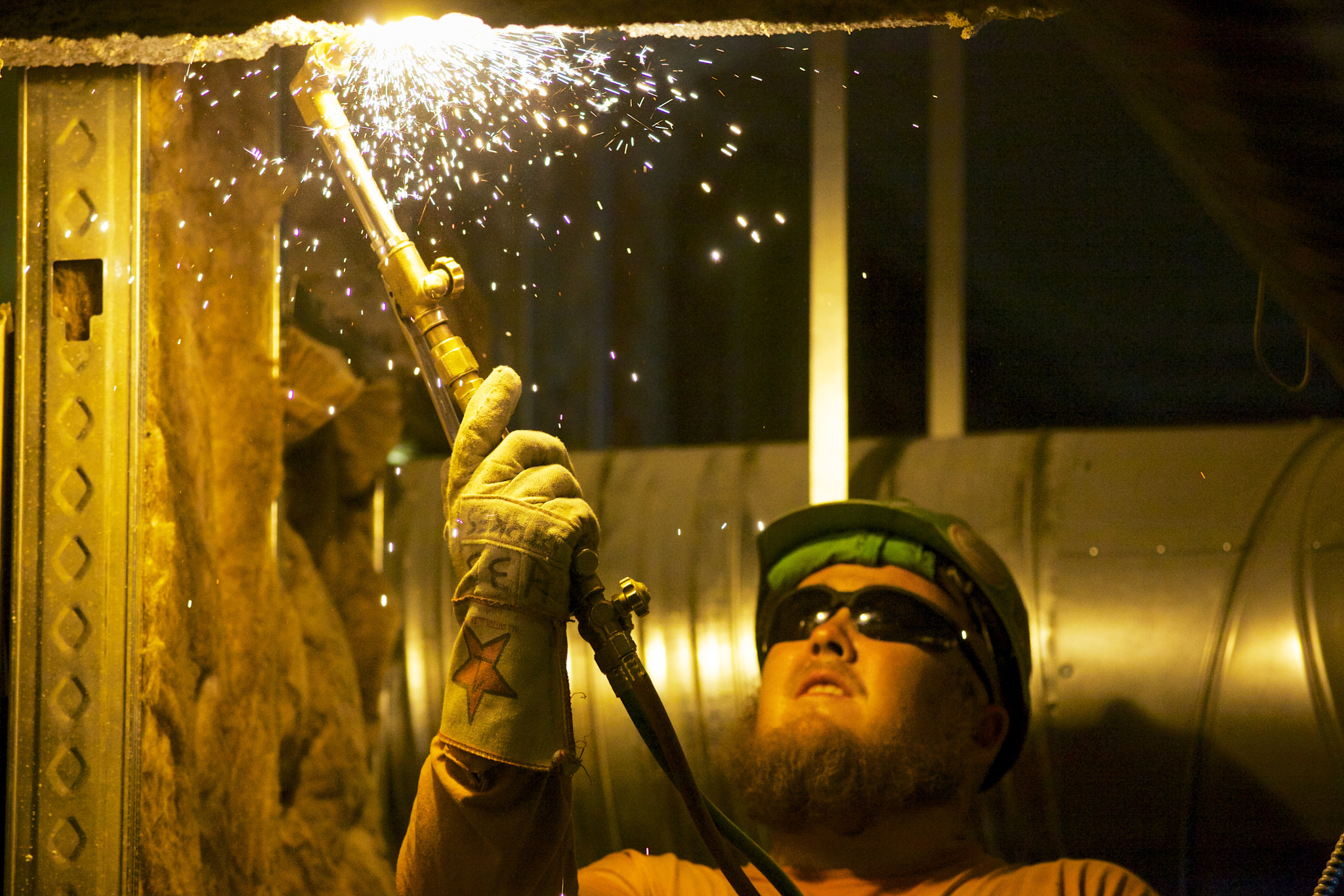 Canon EF 300mm F4L IS USM sample photo. Iron worker with sparks photography